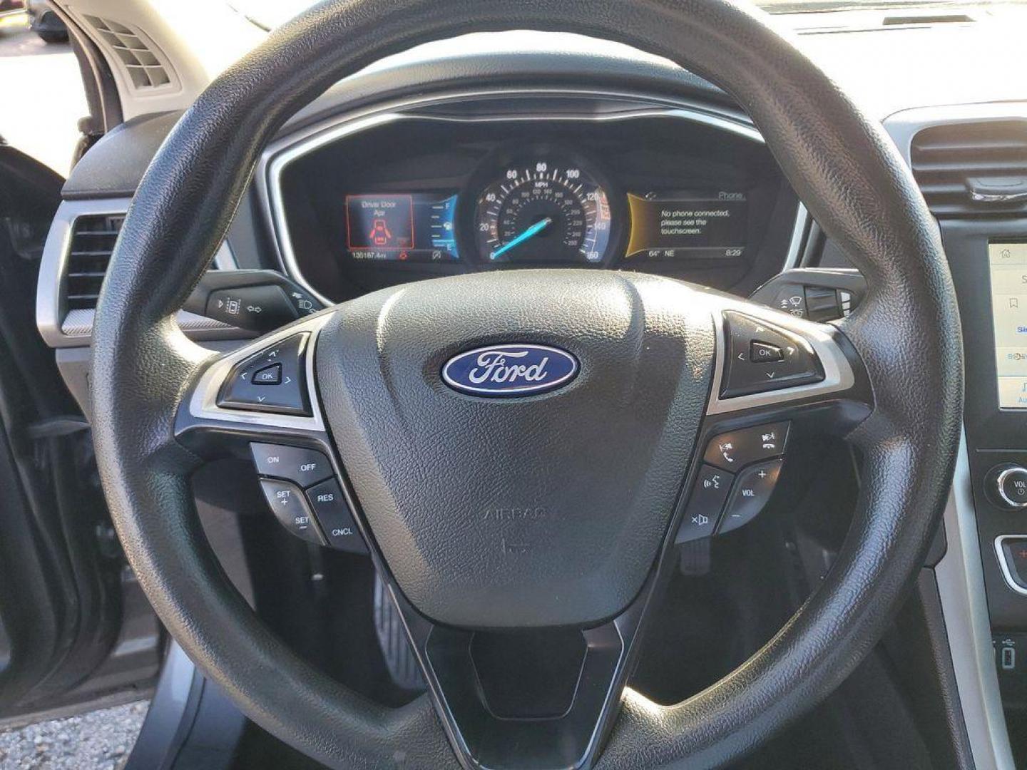 2020 Magnetic Metallic /Ebony Ford Fusion SE (3FA6P0HD6LR) with an 1.5L L4 DOHC 16V engine, 6A transmission, located at 6064 Gull Rd, Kalamazoo, MI, 49048, (269) 222-0088, 42.328388, -85.512924 - Introducing the 2020 Ford Fusion SE, a standout in its class, known for its reliability and sleek design. This model comes equipped with Front-Wheel Drive (FWD) and a robust L4, 1.5L engine, delivering a balance of power and efficiency, making it an ideal choice for both city commuting and highway a - Photo#20