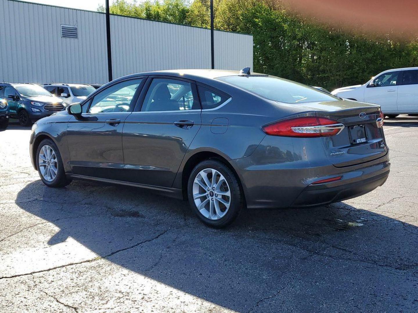 2020 Magnetic Metallic /Ebony Ford Fusion SE (3FA6P0HD6LR) with an 1.5L L4 DOHC 16V engine, 6A transmission, located at 6064 Gull Rd, Kalamazoo, MI, 49048, (269) 222-0088, 42.328388, -85.512924 - Introducing the 2020 Ford Fusion SE, a standout in its class, known for its reliability and sleek design. This model comes equipped with Front-Wheel Drive (FWD) and a robust L4, 1.5L engine, delivering a balance of power and efficiency, making it an ideal choice for both city commuting and highway a - Photo#2