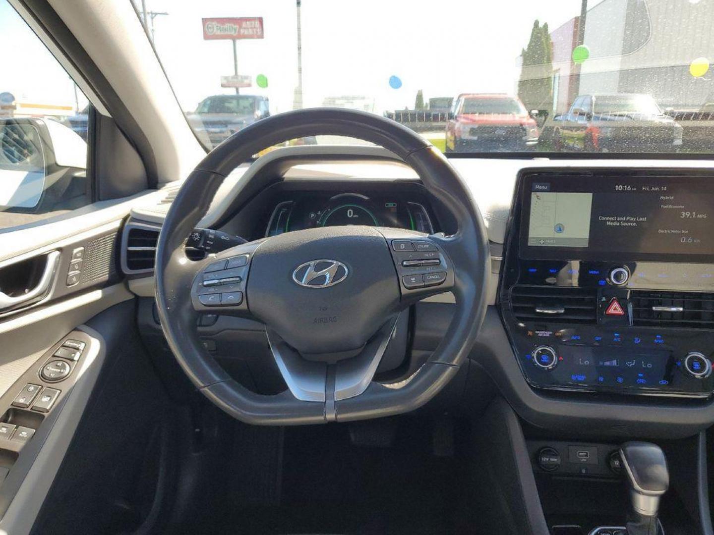 2020 Ceramic White /Gray Hyundai Ioniq Hybrid Limited (KMHC05LC5LU) with an 1.6L L4 DOHC 16V HYBRID engine, 6A transmission, located at 6064 Gull Rd, Kalamazoo, MI, 49048, (269) 222-0088, 42.328388, -85.512924 - <b>Vehicle Details</b><br>Presenting the 2020 Hyundai IONIQ Hybrid Limited, a sophisticated blend of efficiency and advanced technology. This meticulously maintained vehicle, featuring front-wheel drive and powered by a 1.6L L4 engine, offers an exceptional driving experience. The IONIQ Hybrid Limit - Photo#11