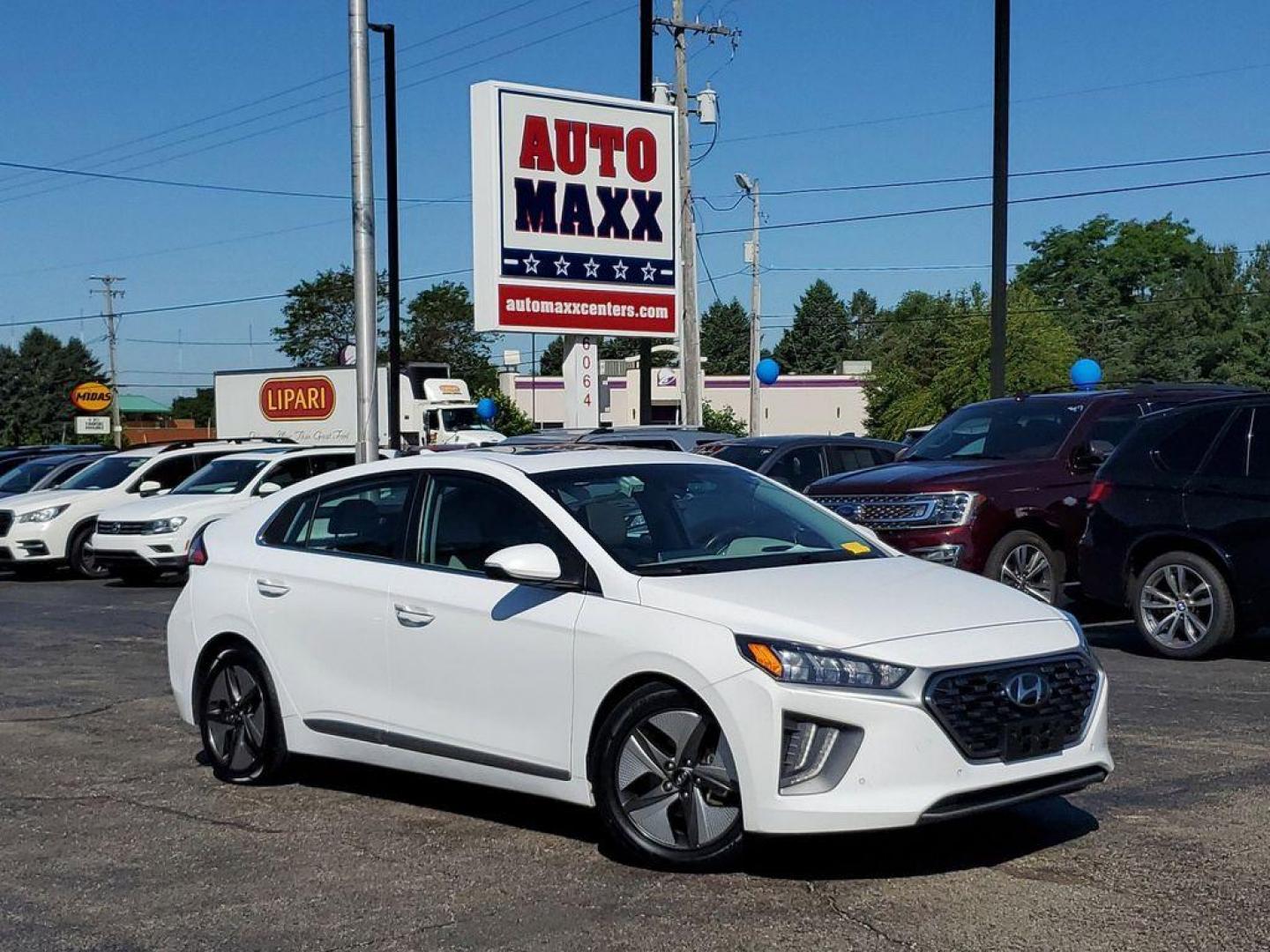 2020 Ceramic White /Gray Hyundai Ioniq Hybrid Limited (KMHC05LC5LU) with an 1.6L L4 DOHC 16V HYBRID engine, 6A transmission, located at 6064 Gull Rd, Kalamazoo, MI, 49048, (269) 222-0088, 42.328388, -85.512924 - <b>Vehicle Details</b><br>Presenting the 2020 Hyundai IONIQ Hybrid Limited, a sophisticated blend of efficiency and advanced technology. This meticulously maintained vehicle, featuring front-wheel drive and powered by a 1.6L L4 engine, offers an exceptional driving experience. The IONIQ Hybrid Limit - Photo#0