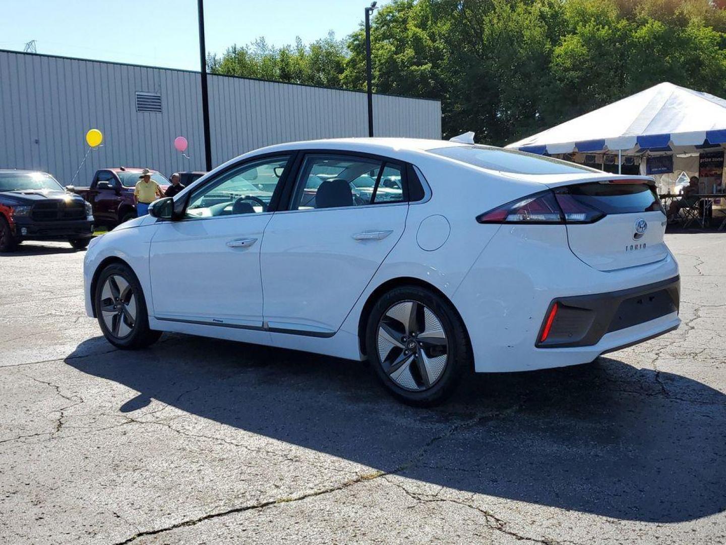 2020 Ceramic White /Gray Hyundai Ioniq Hybrid Limited (KMHC05LC5LU) with an 1.6L L4 DOHC 16V HYBRID engine, 6A transmission, located at 6064 Gull Rd, Kalamazoo, MI, 49048, (269) 222-0088, 42.328388, -85.512924 - <b>Vehicle Details</b><br>Presenting the 2020 Hyundai IONIQ Hybrid Limited, a sophisticated blend of efficiency and advanced technology. This meticulously maintained vehicle, featuring front-wheel drive and powered by a 1.6L L4 engine, offers an exceptional driving experience. The IONIQ Hybrid Limit - Photo#2