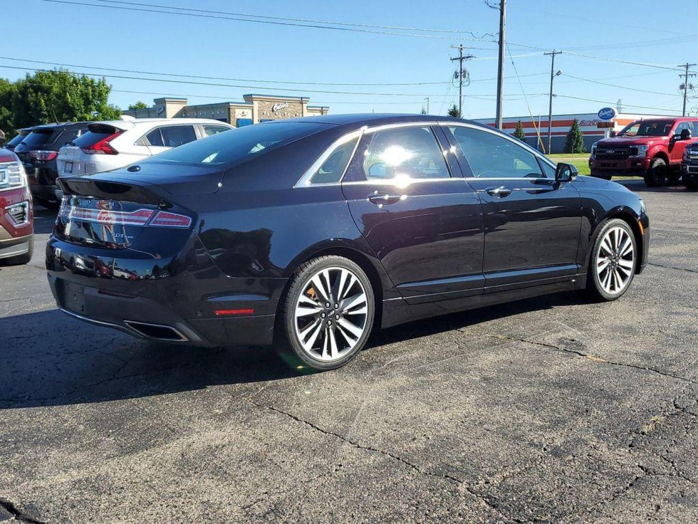 2020 Infinite Black Metallic /Ebony Lincoln MKZ Reserve AWD (3LN6L5F90LR) with an 2.0L L4 DOHC 16V engine, 6A transmission, located at 6064 Gull Rd, Kalamazoo, MI, 49048, (269) 222-0088, 42.328388, -85.512924 - For Sale: 2020 Lincoln MKZ Reserve AWD<br><br>Elevate your driving experience with this stunning 2020 Lincoln MKZ Reserve, now available at our dealership. This exceptional sedan combines luxury, performance, and advanced technology to deliver a driving experience like no other.<br><br>Under the hoo - Photo#3