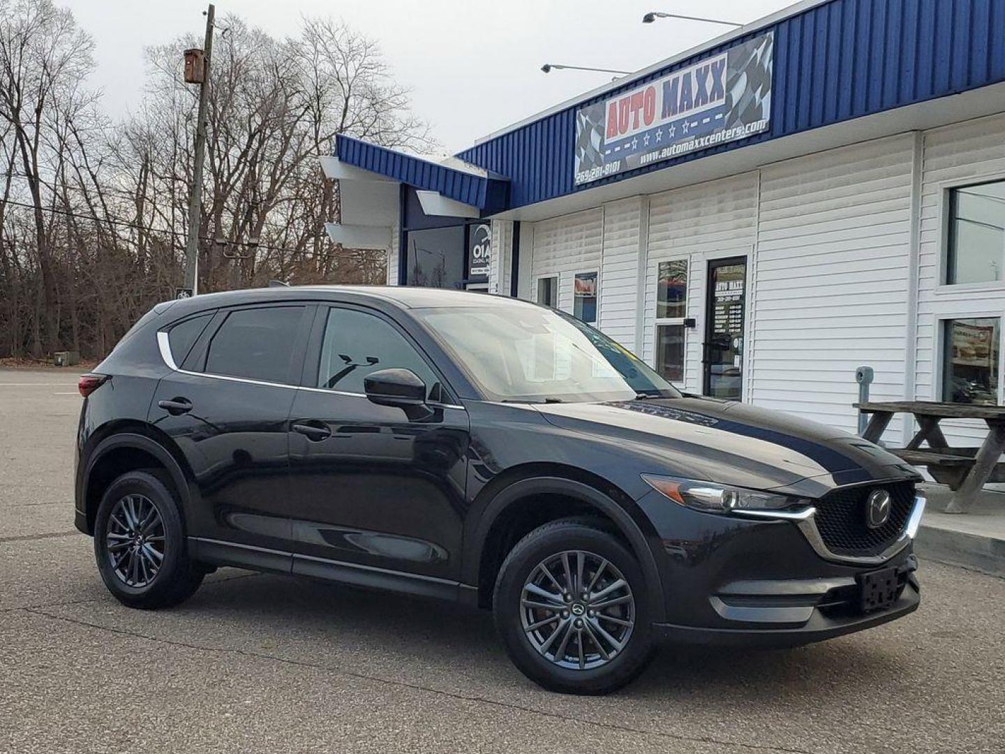 2020 Jet Black Mica /Black Mazda CX-5 Touring AWD (JM3KFBCM9L0) with an 2.5L L4 DOHC 16V engine, 6A transmission, located at 234 Columbia Ave, Battle Creek, MI, 49015, (269) 222-0088, 42.298264, -85.192543 - <b>Vehicle Details</b><br>Introducing the 2020 Mazda CX-5 Touring AWD, a perfect blend of performance, style, and modern technology. This exceptional SUV, powered by a 2.5L 4-cylinder engine, offers a dynamic driving experience with impressive fuel efficiency. The all-wheel-drive system ensures conf - Photo#0