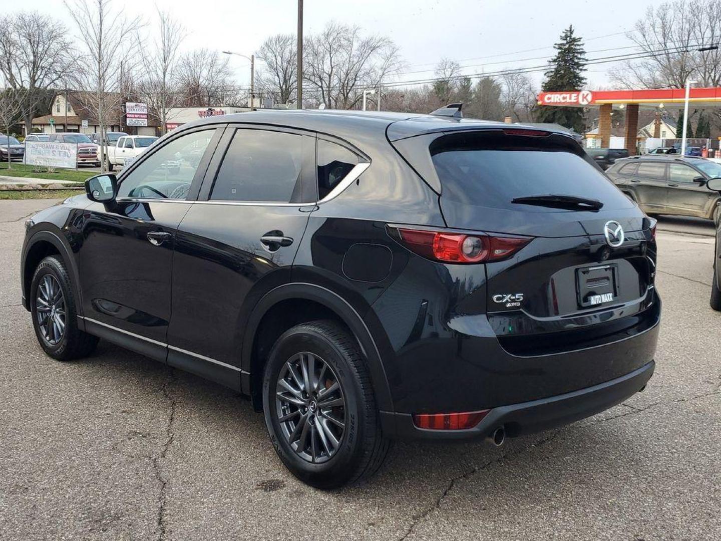 2020 Jet Black Mica /Black Mazda CX-5 Touring AWD (JM3KFBCM9L0) with an 2.5L L4 DOHC 16V engine, 6A transmission, located at 234 Columbia Ave, Battle Creek, MI, 49015, (269) 222-0088, 42.298264, -85.192543 - <b>Vehicle Details</b><br>Introducing the 2020 Mazda CX-5 Touring AWD, a perfect blend of performance, style, and modern technology. This exceptional SUV, powered by a 2.5L 4-cylinder engine, offers a dynamic driving experience with impressive fuel efficiency. The all-wheel-drive system ensures conf - Photo#2