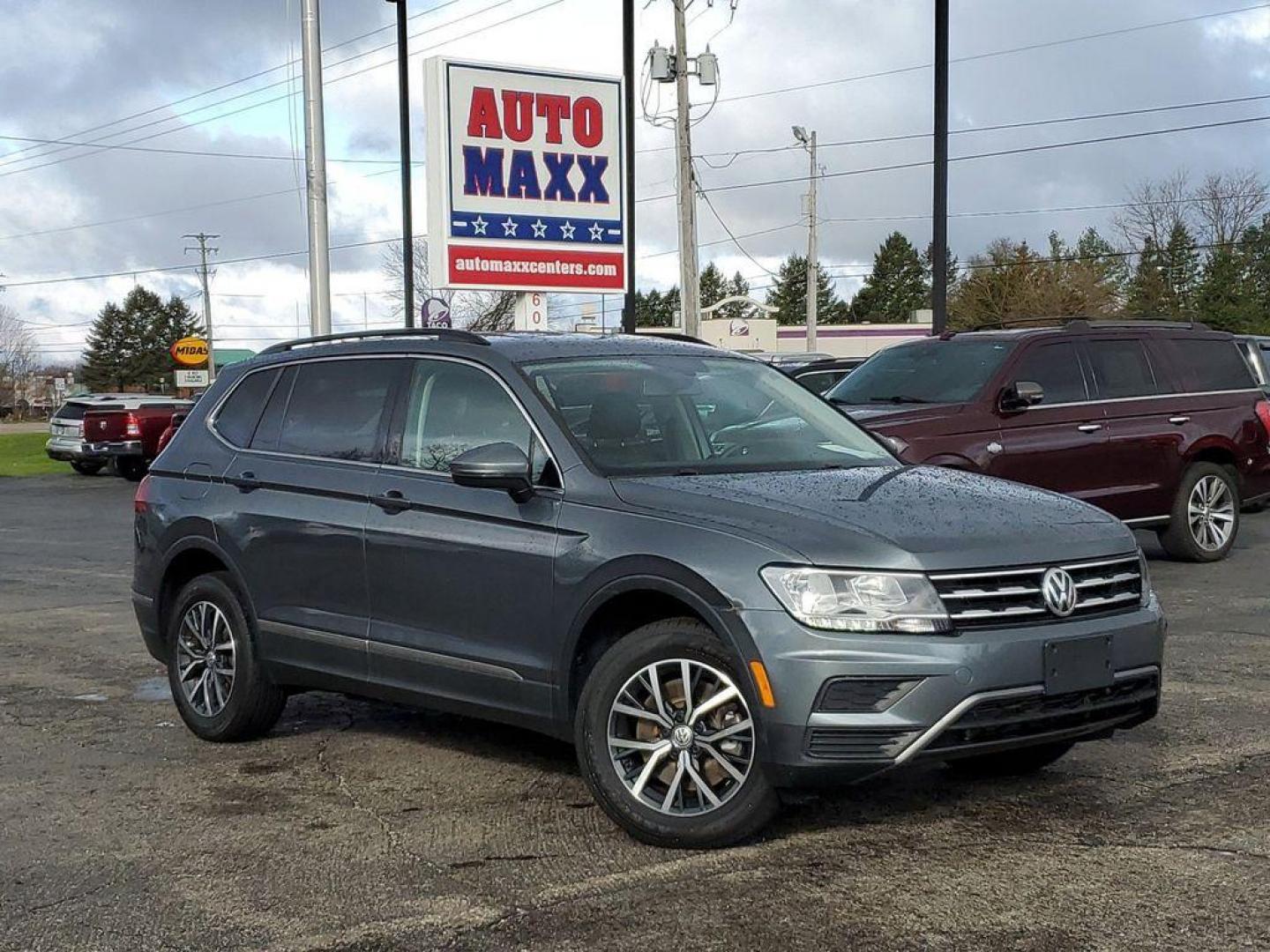 2020 Platinum Gray Metallic /Storm Gray Volkswagen Tiguan SE 4Motion AWD (3VV2B7AX8LM) with an 2.0L L4 DOHC 16V TURBO engine, 8A transmission, located at 6064 Gull Rd, Kalamazoo, MI, 49048, (269) 222-0088, 42.328388, -85.512924 - Looking for a reliable and stylish SUV that can handle any terrain? Look no further than this 2020 Volkswagen Tiguan with AWD and a powerful L4, 2.0L engine. With only 74957 miles on the odometer, this Tiguan is ready to take you on your next adventure.<br><br>This vehicle comes with a CARFAX Clean - Photo#0