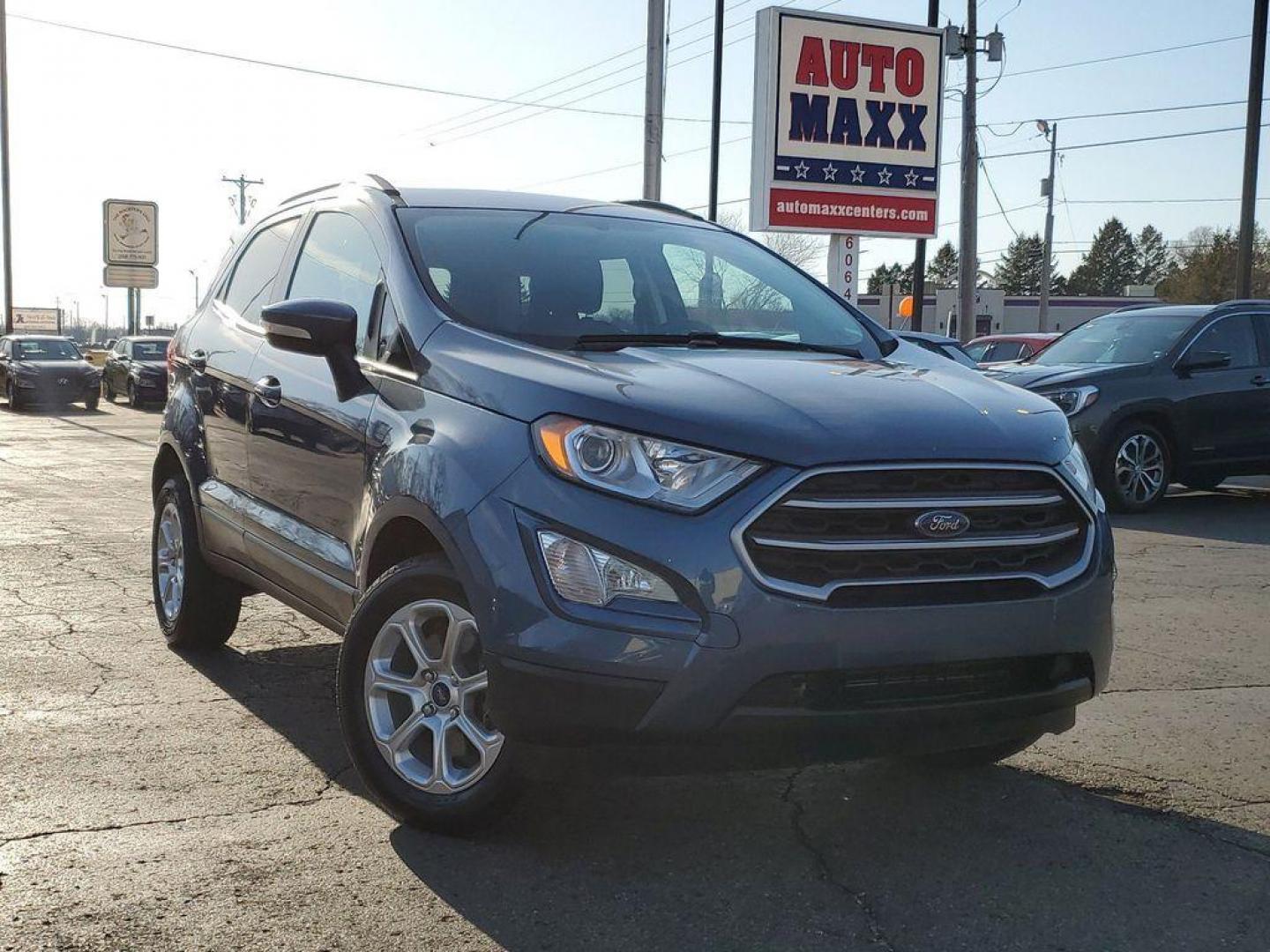 2021 Blue Metallic /Ebony Black Ford EcoSport SE AWD (MAJ6S3GL6MC) with an 2.0L L4 DOHC 16V engine, 6A transmission, located at 234 Columbia Ave, Battle Creek, MI, 49015, (269) 222-0088, 42.298264, -85.192543 - <b>Vehicle Details</b><br>Looking for a reliable and stylish SUV that can handle any terrain? Look no further than this incredible 2021 Ford Ecosport SE! With only 53576 miles on the odometer, this vehicle is practically brand new and ready to hit the road. Equipped with a powerful L4, 2.0L engine - Photo#1