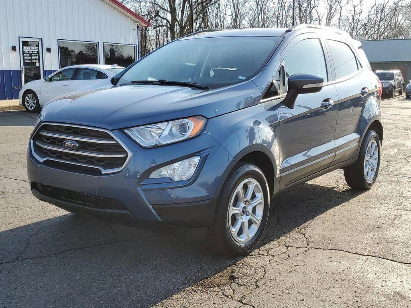 2021 Blue Metallic /Ebony Black Ford EcoSport SE AWD (MAJ6S3GL6MC) with an 2.0L L4 DOHC 16V engine, 6A transmission, located at 234 Columbia Ave, Battle Creek, MI, 49015, (269) 222-0088, 42.298264, -85.192543 - <b>Vehicle Details</b><br>Looking for a reliable and stylish SUV that can handle any terrain? Look no further than this incredible 2021 Ford Ecosport SE! With only 53576 miles on the odometer, this vehicle is practically brand new and ready to hit the road. Equipped with a powerful L4, 2.0L engine - Photo#2