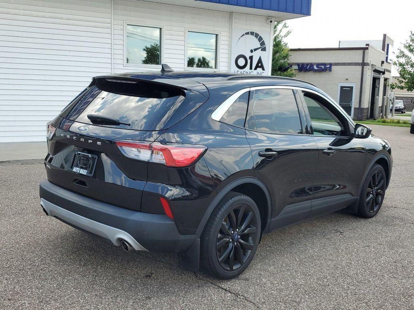 2021 Agate Black Metallic /Ebony Ford Escape SEL (1FMCU0H6XMU) with an 1.5L L3 engine, 6A transmission, located at 6064 Gull Rd, Kalamazoo, MI, 49048, (269) 222-0088, 42.328388, -85.512924 - <b>Vehicle Details</b><br>For Sale: 2021 Ford Escape SEL - A Blend of Style and Performance! Introducing a meticulously maintained 2021 Ford Escape SEL with only 38,121 miles on the odometer. This versatile SUV combines modern technology with dependable performance, making it an ideal choice for fa - Photo#1