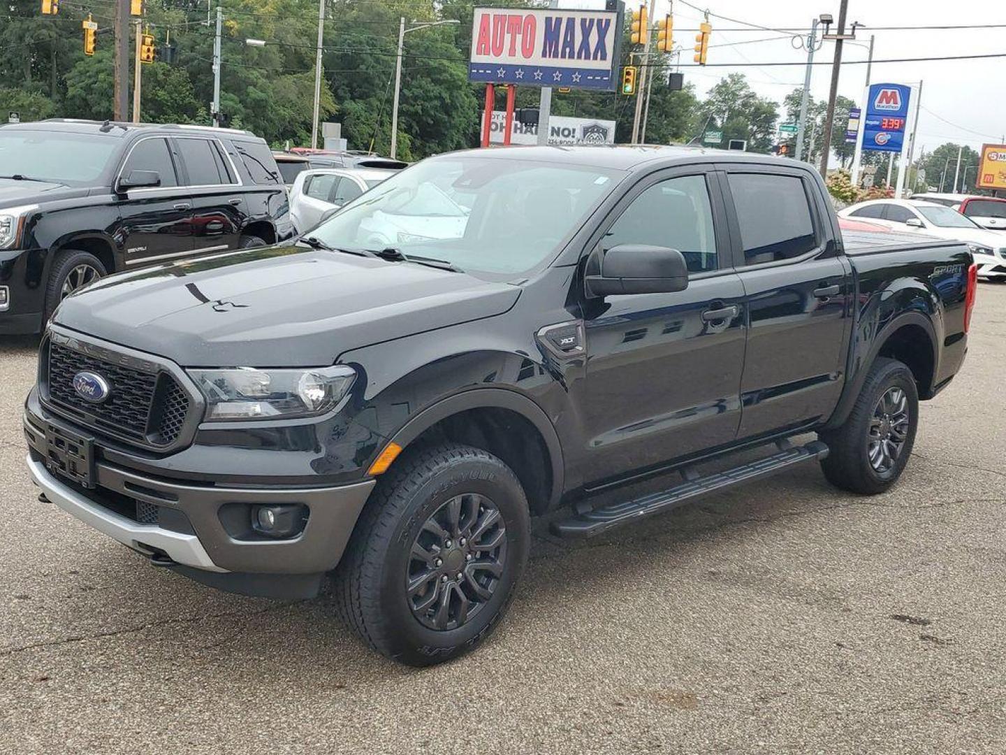 2021 Shadow Black /Ebony Ford Ranger XL SuperCrew 4WD (1FTER4FH7ML) with an 2.3L L4 DOHC 16V engine, 10A transmission, located at 234 Columbia Ave, Battle Creek, MI, 49015, (269) 222-0088, 42.298264, -85.192543 - <b>Vehicle Details</b><br>Discover the perfect blend of power and versatility with this stunning pre-owned 2021 Ford Ranger XLT! This dynamic vehicle is built to conquer any terrain with its robust 4WD system and efficient 4 Cyl, 2.3L engine, delivering both impressive performance and remarkable fue - Photo#3