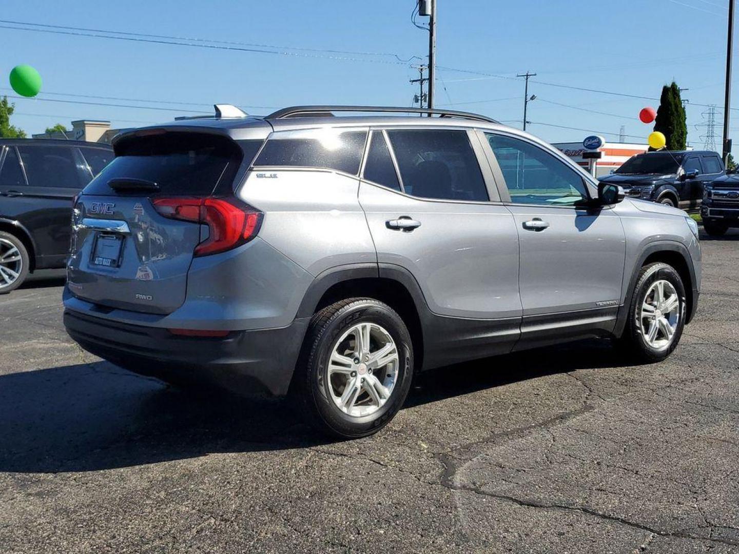 2021 Blue Emerald Metallic GMC Terrain SLE AWD (3GKALTEV1ML) with an 1.4L L4 DOHC 16V TURBO engine, 6A transmission, located at 234 Columbia Ave, Battle Creek, MI, 49015, (269) 222-0088, 42.298264, -85.192543 - <b>Vehicle Details</b><br>Rev up your driving experience with this exceptional 2021 GMC Terrain SLE! This robust SUV is ready to conquer any road with its impressive AWD capability and a fuel-efficient L4, 1.5L engine. Whether you're navigating city streets or exploring off-the-beaten paths, this Te - Photo#3