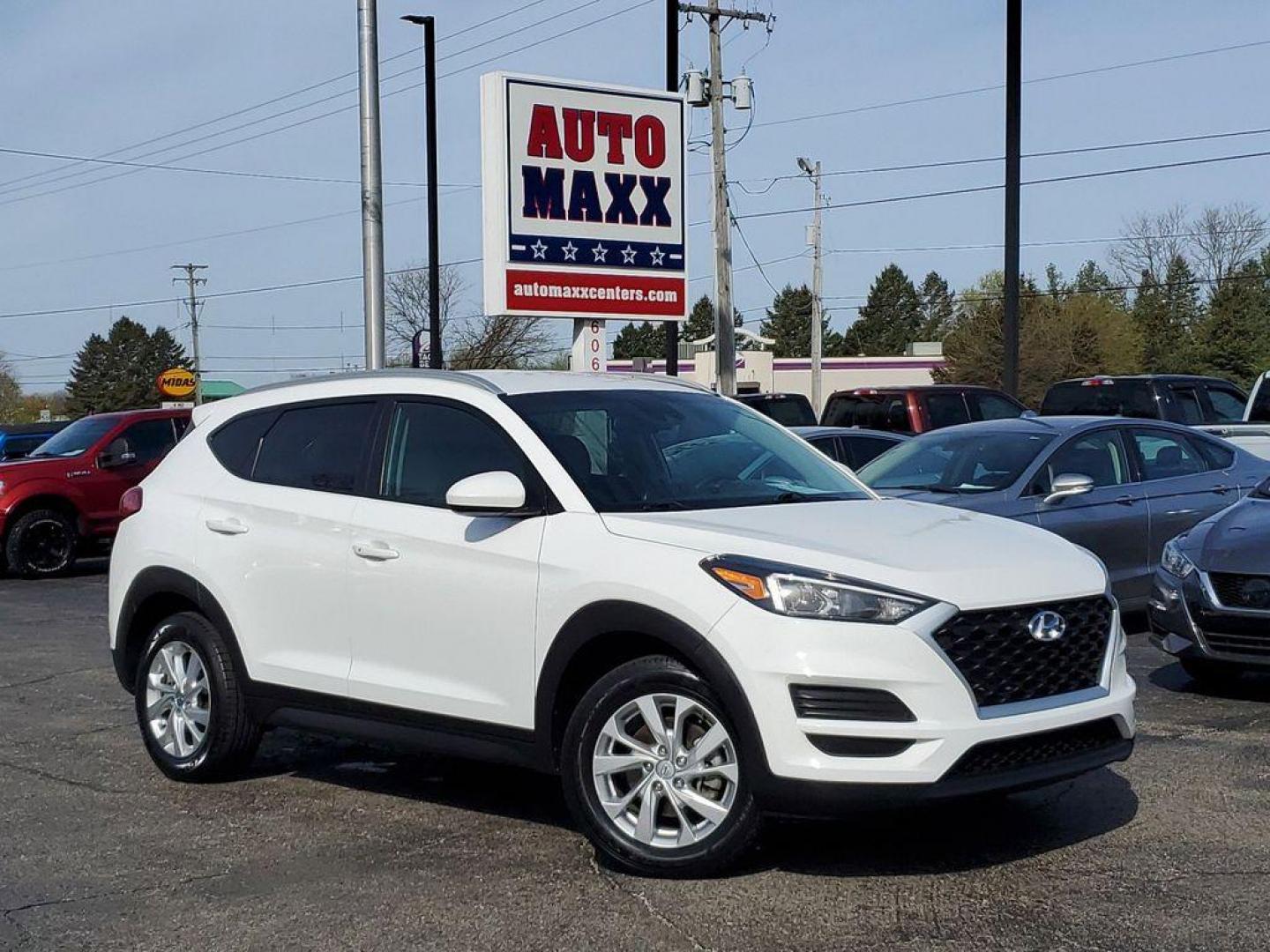 2021 Winter White /Gray Hyundai Tucson Sport (KM8J33A43MU) with an 2.0L L4 DOHC 16V engine, 6A transmission, located at 6064 Gull Rd, Kalamazoo, MI, 49048, (269) 222-0088, 42.328388, -85.512924 - Introducing the sleek and reliable 2021 Hyundai Tucson Value, now available at our dealership. This stylish SUV comes equipped with a fuel-efficient L4, 2.0L engine that delivers a smooth and responsive driving experience. With only 103305 miles on the odometer, this well-maintained vehicle is ready - Photo#0