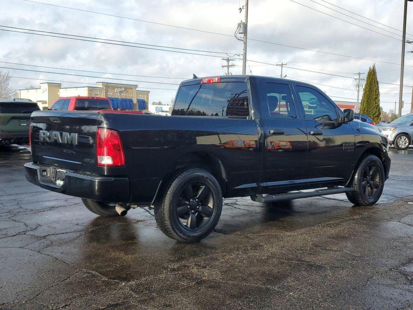 2021 BLACK /GREY RAM 1500 Classic Tradesman Quad Cab 4WD (1C6RR7FG5MS) with an 3.6L V6 DOHC 24V FFV engine, 8A transmission, located at 6064 Gull Rd, Kalamazoo, MI, 49048, (269) 222-0088, 42.328388, -85.512924 - For sale: a robust and reliable 2021 Ram 1500 Classic EXPRESS with just 46,390 miles. Equipped with a powerful V6, 3.6L engine and 4WD, this truck is ready to tackle any adventure, whether you're hitting the trails or cruising on the highway. Experience the perfect blend of comfort and capability.<b - Photo#3