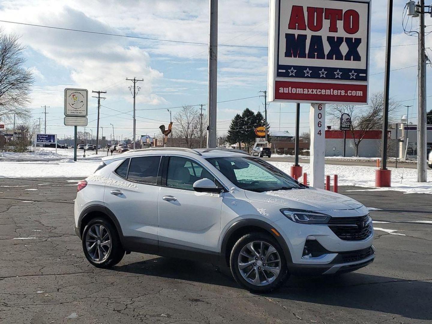 2022 White Frost Tricoat /Whisper Beige w/Ebony Accents Buick Encore GX Essence (KL4MMFSL2NB) with an 1.3L L3 TURBO engine, CVT transmission, located at 6064 Gull Rd, Kalamazoo, MI, 49048, (269) 222-0088, 42.328388, -85.512924 - <b>Vehicle Details</b><br>Discover the epitome of modern sophistication and efficiency with the 2022 Buick Encore GX Essence! This sleek crossover combines luxury with practicality, offering a driving experience that's both exhilarating and comfortable. The heart of this vehicle is its spirited 3-cy - Photo#0