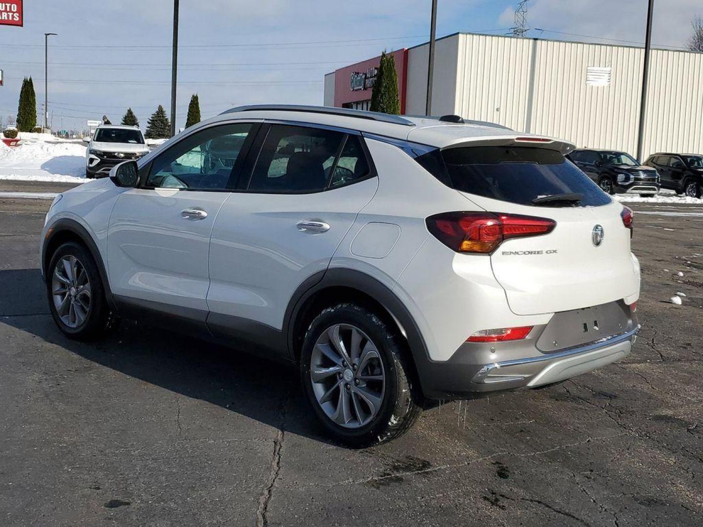 2022 White Frost Tricoat /Whisper Beige w/Ebony Accents Buick Encore GX Essence (KL4MMFSL2NB) with an 1.3L L3 TURBO engine, CVT transmission, located at 6064 Gull Rd, Kalamazoo, MI, 49048, (269) 222-0088, 42.328388, -85.512924 - <b>Vehicle Details</b><br>Discover the epitome of modern sophistication and efficiency with the 2022 Buick Encore GX Essence! This sleek crossover combines luxury with practicality, offering a driving experience that's both exhilarating and comfortable. The heart of this vehicle is its spirited 3-cy - Photo#2