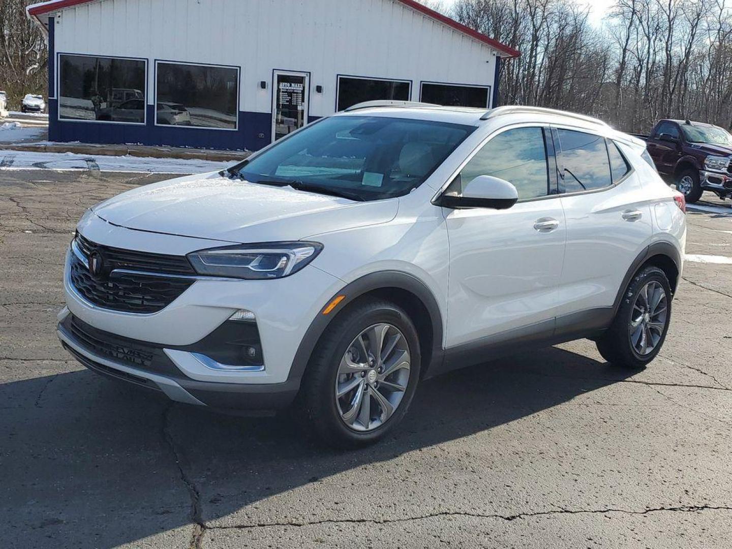 2022 White Frost Tricoat /Whisper Beige w/Ebony Accents Buick Encore GX Essence (KL4MMFSL2NB) with an 1.3L L3 TURBO engine, CVT transmission, located at 6064 Gull Rd, Kalamazoo, MI, 49048, (269) 222-0088, 42.328388, -85.512924 - <b>Vehicle Details</b><br>Discover the epitome of modern sophistication and efficiency with the 2022 Buick Encore GX Essence! This sleek crossover combines luxury with practicality, offering a driving experience that's both exhilarating and comfortable. The heart of this vehicle is its spirited 3-cy - Photo#3