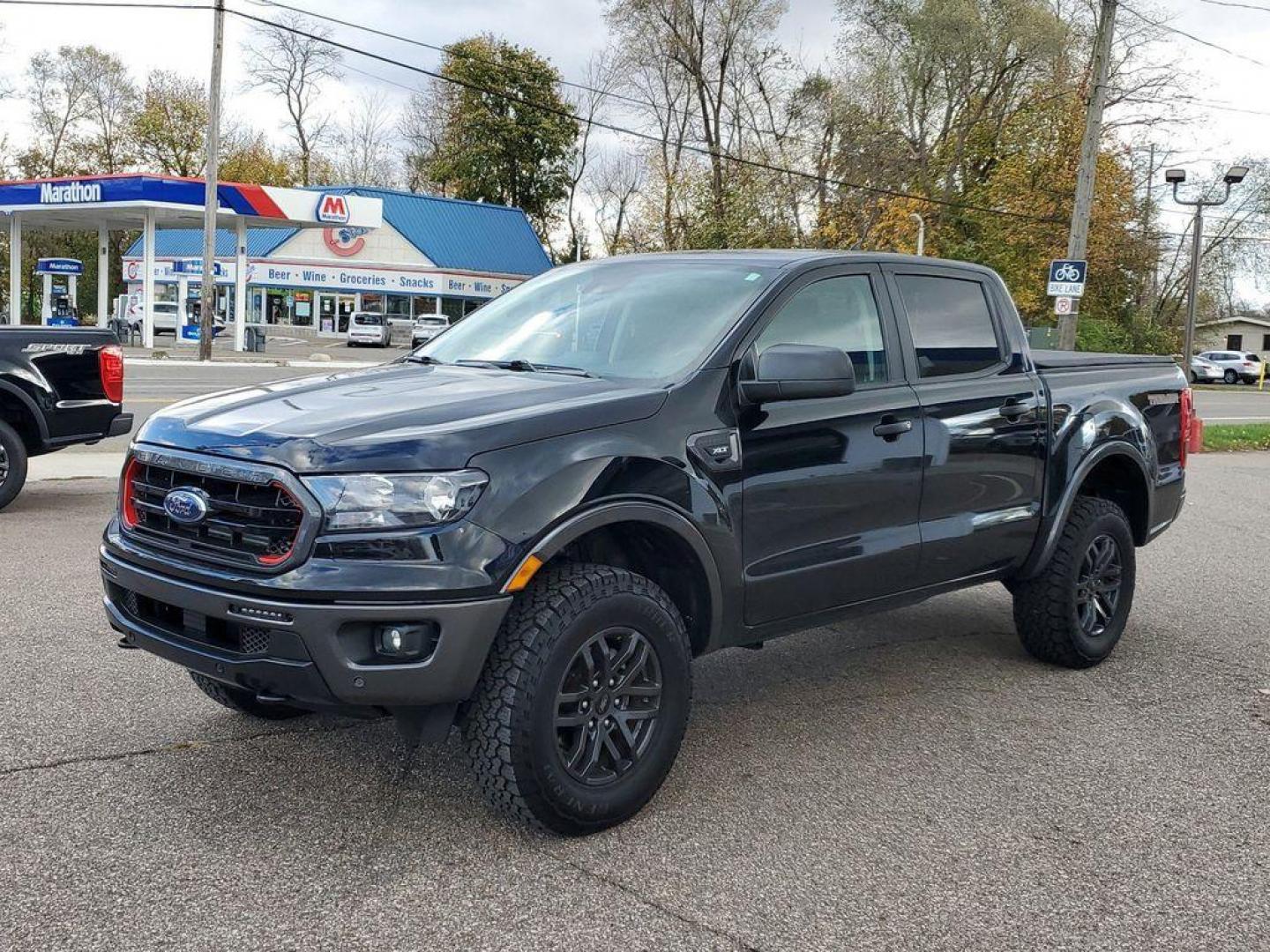 2022 Shadow Black /Ebony Ford Ranger XL SuperCrew 4WD (1FTER4FH7NL) with an 2.3L L4 DOHC 16V engine, 10A transmission, located at 234 Columbia Ave, Battle Creek, MI, 49015, (269) 222-0088, 42.298264, -85.192543 - <b>Vehicle Details</b><br>Tremor Package Discover the perfect blend of power and comfort with our 2022 Ford Ranger, now available at our dealership. This impressive pickup boasts a robust 4WD system and a 4-cylinder, 2.3L engine, offering both efficiency and the capability to tackle any terrain with - Photo#3