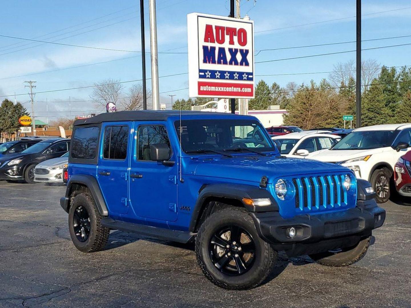 2022 Hydro Blue Pearl /Black Jeep Wrangler Unlimited Sport (1C4HJXDG2NW) with an 3.6L V6 DOHC 24V FFV engine, 6A transmission, located at 234 Columbia Ave, Battle Creek, MI, 49015, (269) 222-0088, 42.298264, -85.192543 - Get ready to take on any adventure with this incredible 2022 Jeep Wrangler Unlimited Sport! With only 13,518 miles on the odometer, this rugged beauty is just getting started. Equipped with a powerful V6, 3.6L engine and 4WD, you can tackle any terrain with ease.<br><br>But that's not all - this Jee - Photo#0