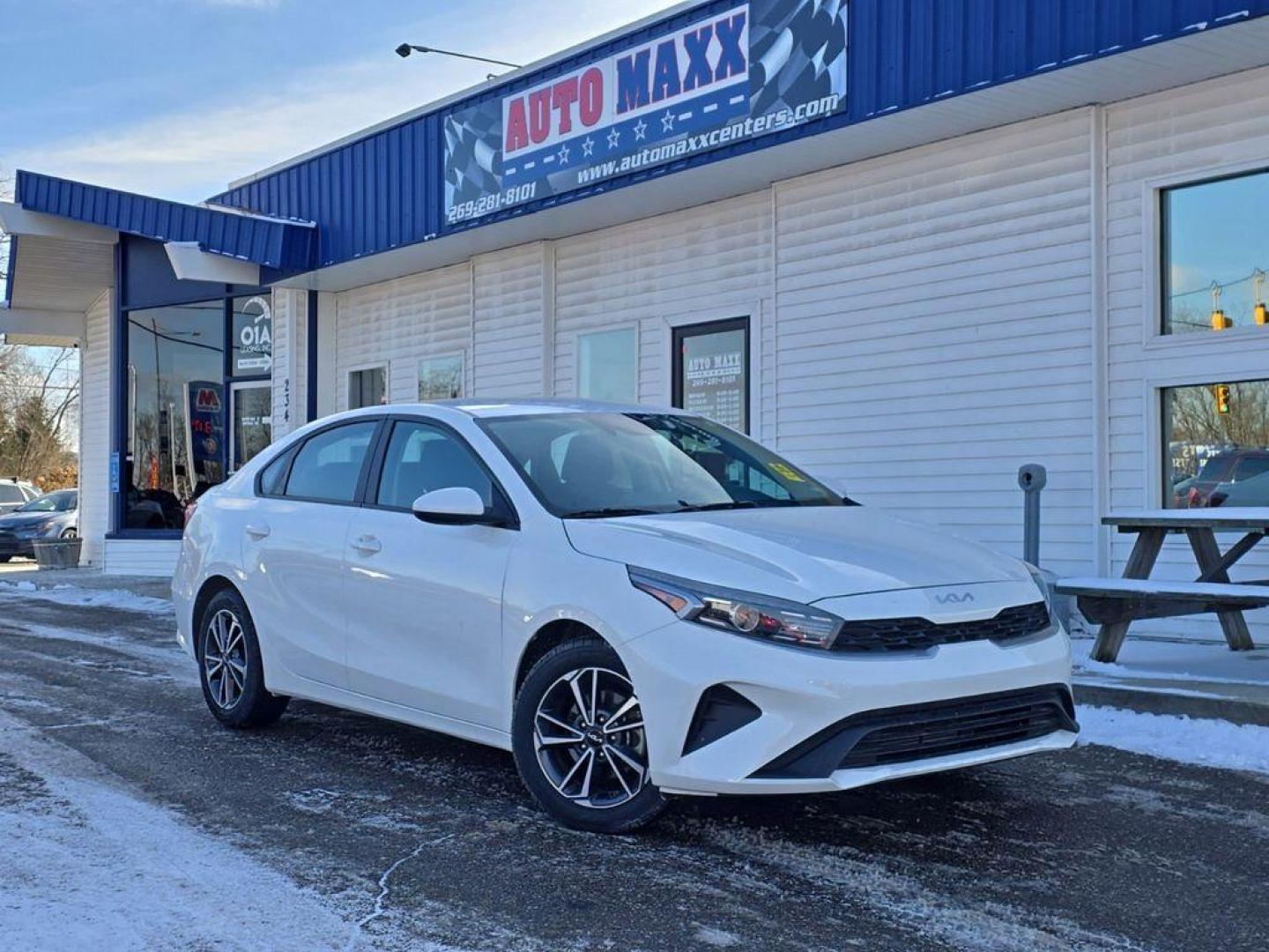 2022 Snow White Pearl /Black Kia Forte FE (3KPF24AD0NE) with an 2.0L L4 DOHC 16V engine, CVT transmission, located at 234 Columbia Ave, Battle Creek, MI, 49015, (269) 222-0088, 42.298264, -85.192543 - <b>Equipment</b><br>Just the right size to accommodate all your needs. It has room for passengers and plenty of trunk space. It comes equipped with Android Auto for seamless smartphone integration on the road. Apple CarPlay: Seamless smartphone integration for the vehicle - stay connected and entert - Photo#0