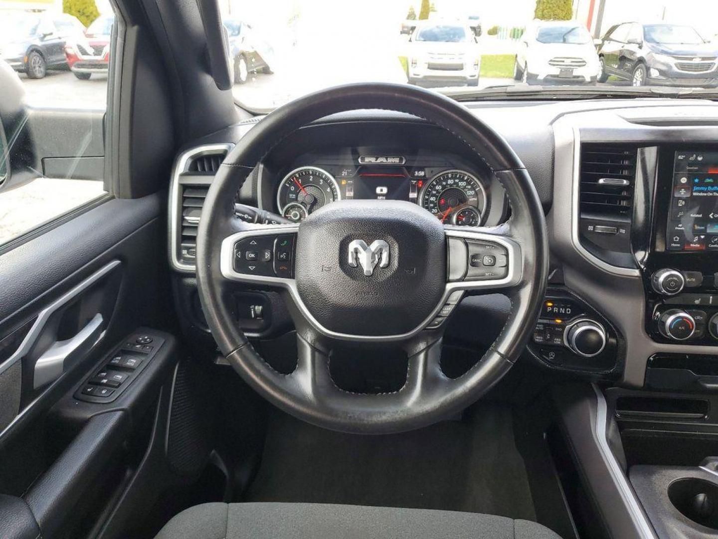 2022 Bright White Clearcoat /Black RAM 1500 Big Horn Crew Cab SWB 4WD (1C6RRFFG6NN) with an 3.6L V6 DOHC 24V engine, 8A transmission, located at 6064 Gull Rd, Kalamazoo, MI, 49048, (269) 222-0088, 42.328388, -85.512924 - <b>Vehicle Details</b><br>This impressive pre-owned 2022 Ram 1500 Big Horn is a top-of-the-line truck with only 45873 miles on it. Equipped with a powerful 3.6L V6 engine, this vehicle offers exceptional performance and capability. The 4WD system ensures that you can tackle any terrain with ease, ma - Photo#14