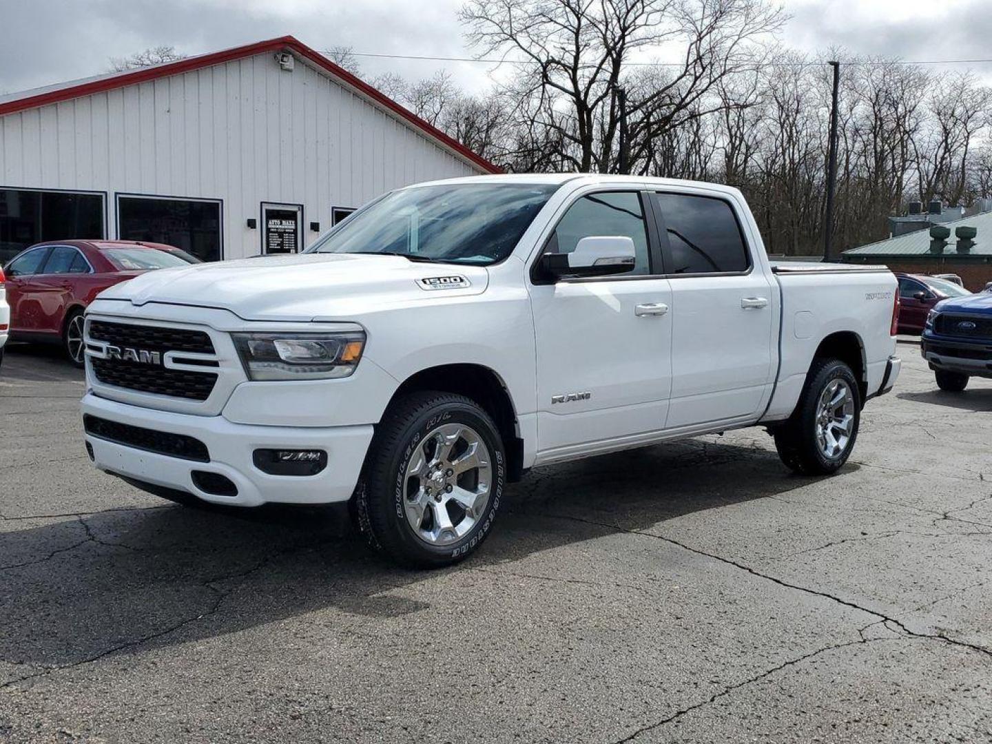 2022 Bright White Clearcoat /Black RAM 1500 Big Horn Crew Cab SWB 4WD (1C6RRFFG6NN) with an 3.6L V6 DOHC 24V engine, 8A transmission, located at 6064 Gull Rd, Kalamazoo, MI, 49048, (269) 222-0088, 42.328388, -85.512924 - <b>Vehicle Details</b><br>This impressive pre-owned 2022 Ram 1500 Big Horn is a top-of-the-line truck with only 45873 miles on it. Equipped with a powerful 3.6L V6 engine, this vehicle offers exceptional performance and capability. The 4WD system ensures that you can tackle any terrain with ease, ma - Photo#1