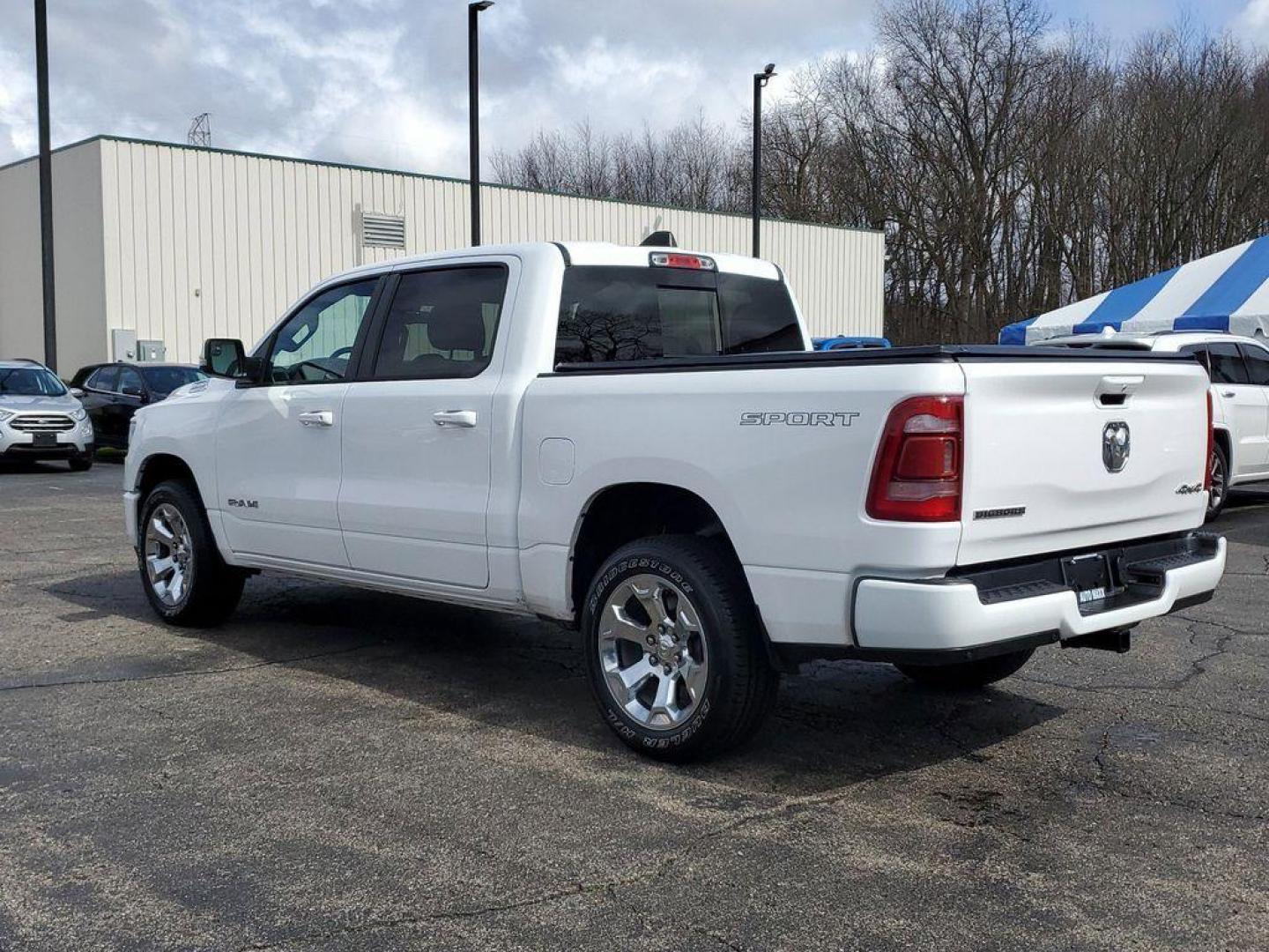 2022 Bright White Clearcoat /Black RAM 1500 Big Horn Crew Cab SWB 4WD (1C6RRFFG6NN) with an 3.6L V6 DOHC 24V engine, 8A transmission, located at 6064 Gull Rd, Kalamazoo, MI, 49048, (269) 222-0088, 42.328388, -85.512924 - <b>Vehicle Details</b><br>This impressive pre-owned 2022 Ram 1500 Big Horn is a top-of-the-line truck with only 45873 miles on it. Equipped with a powerful 3.6L V6 engine, this vehicle offers exceptional performance and capability. The 4WD system ensures that you can tackle any terrain with ease, ma - Photo#2