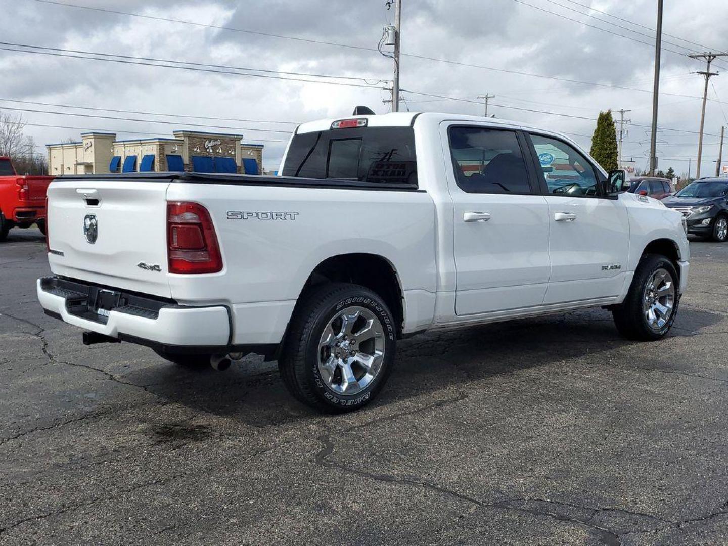 2022 Bright White Clearcoat /Black RAM 1500 Big Horn Crew Cab SWB 4WD (1C6RRFFG6NN) with an 3.6L V6 DOHC 24V engine, 8A transmission, located at 6064 Gull Rd, Kalamazoo, MI, 49048, (269) 222-0088, 42.328388, -85.512924 - <b>Vehicle Details</b><br>This impressive pre-owned 2022 Ram 1500 Big Horn is a top-of-the-line truck with only 45873 miles on it. Equipped with a powerful 3.6L V6 engine, this vehicle offers exceptional performance and capability. The 4WD system ensures that you can tackle any terrain with ease, ma - Photo#3