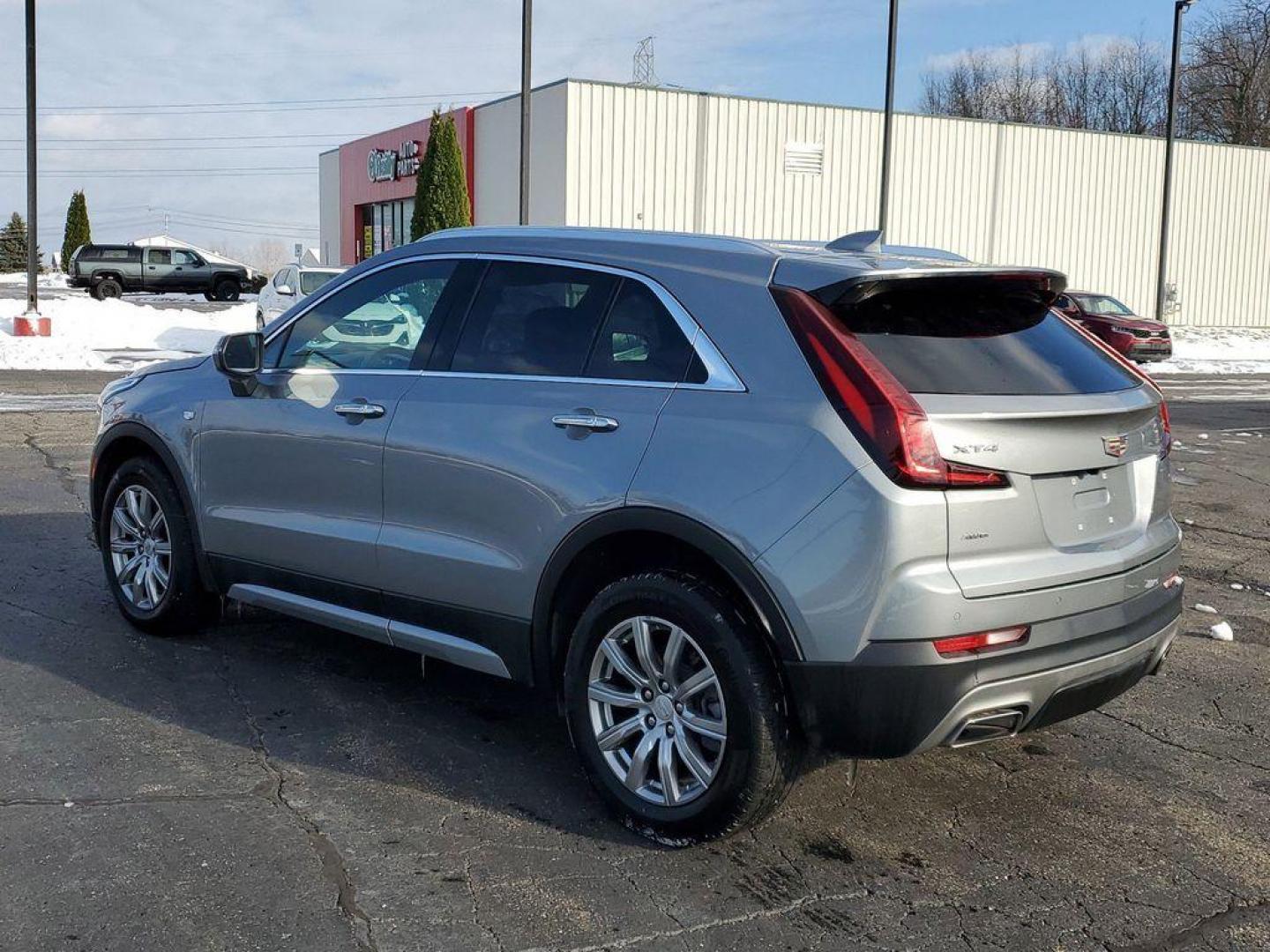 2023 Argent Silver Metallic /Jet Black Cadillac XT4 Premium Luxury AWD (1GYFZDR4XPF) with an 2.0L L4 DOHC 16V engine, 9A transmission, located at 6064 Gull Rd, Kalamazoo, MI, 49048, (269) 222-0088, 42.328388, -85.512924 - <b>Vehicle Details</b><br>Introducing the 2023 Cadillac XT4 AWD Premium Luxuryan exceptional blend of style, performance, and sophistication, now available for you to own! With just 48,064 miles, this one-owner beauty has been meticulously maintained, offering a premium driving experience that stand - Photo#2