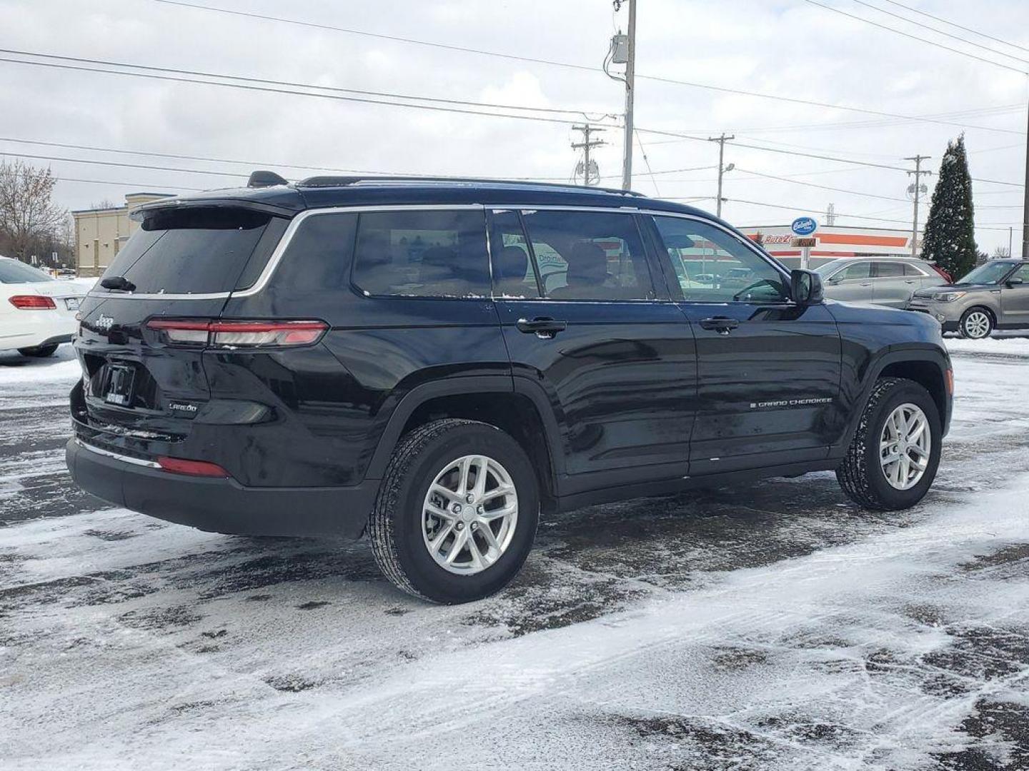 2023 Diamond Black Crystal Pearlcoat /Global Black Jeep Grand Cherokee L Laredo 4WD (1C4RJKAGXP8) with an 3.6L V6 DOHC 24V engine, 8A transmission, located at 6064 Gull Rd, Kalamazoo, MI, 49048, (269) 222-0088, 42.328388, -85.512924 - <b>Vehicle Details</b><br>Unleash your adventurous spirit with this stunning 2023 Jeep Grand Cherokee L Laredo, a masterpiece of power and sophistication designed for both the urban jungle and the great outdoors. This robust SUV, with its 4WD capability, ensures you conquer any terrain with confiden - Photo#3