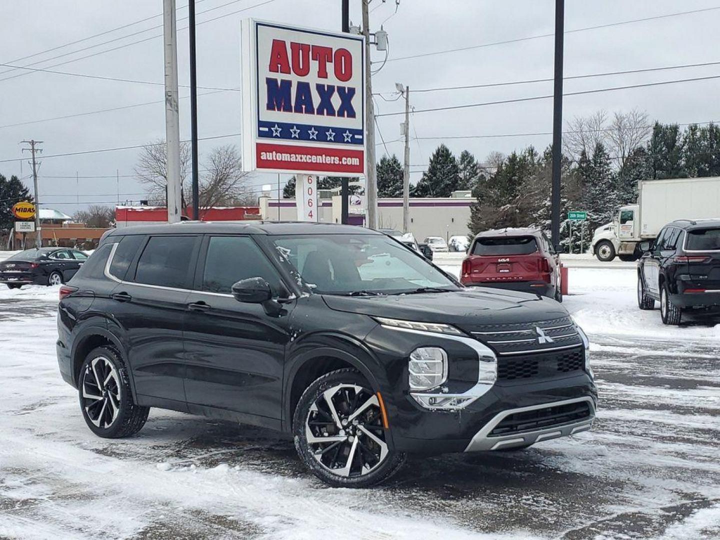 2023 Black Diamond /Black Mitsubishi Outlander SE 4WD (JA4J4UA81PZ) with an 2.4L L4 DOHC 16V engine, CVT transmission, located at 6064 Gull Rd, Kalamazoo, MI, 49048, (269) 222-0088, 42.328388, -85.512924 - Carry lots of cargo while your passengers are comfortable. The Mitsubishi Outlander has automated speed control that adjusts to maintain a safe following distance, enhancing highway driving convenience. This model is equipped with all wheel drive. This unit comes equipped with Android Auto for seaml - Photo#0