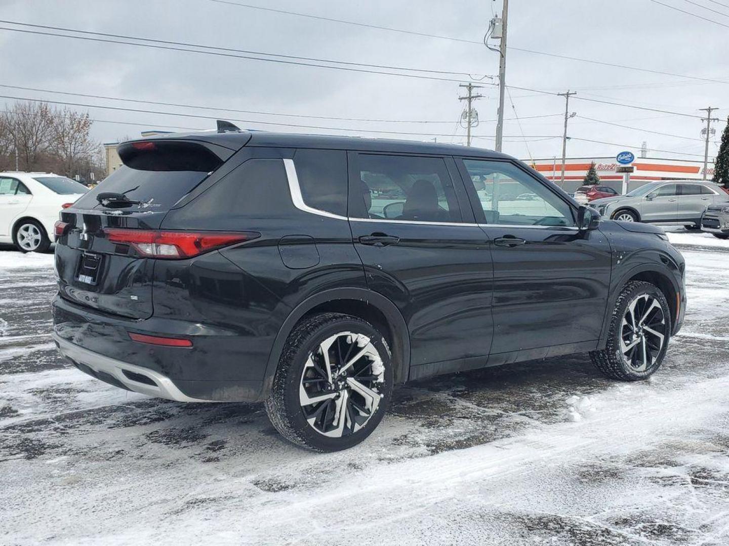 2023 Black Diamond /Black Mitsubishi Outlander SE 4WD (JA4J4UA81PZ) with an 2.4L L4 DOHC 16V engine, CVT transmission, located at 6064 Gull Rd, Kalamazoo, MI, 49048, (269) 222-0088, 42.328388, -85.512924 - Carry lots of cargo while your passengers are comfortable. The Mitsubishi Outlander has automated speed control that adjusts to maintain a safe following distance, enhancing highway driving convenience. This model is equipped with all wheel drive. This unit comes equipped with Android Auto for seaml - Photo#3