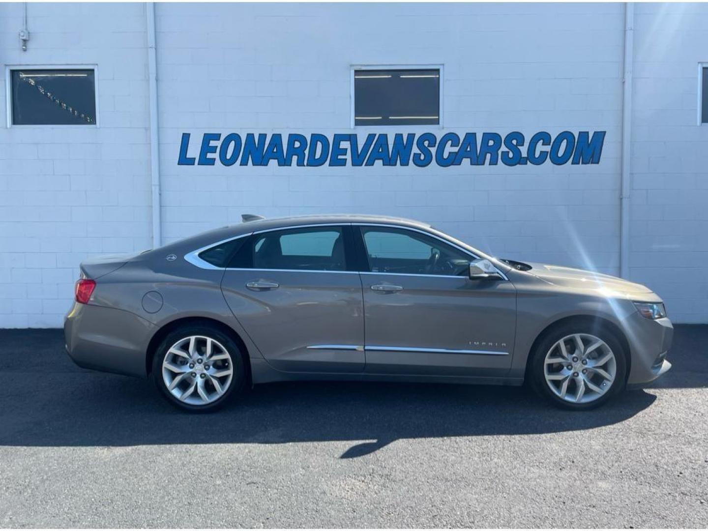 2018 Pepperdust Metallic /Jet Black Chevrolet Impala Premier (2G1125S36J9) with an 3.6L V6 DOHC 24V engine, 6A transmission, located at 6064 Gull Rd, Kalamazoo, MI, 49048, (269) 222-0088, 42.328388, -85.512924 - <b>Equipment</b><br>You'll never again be lost in a crowded city or a country region with the navigation system on this Chevrolet Impala. Engulf yourself with the crystal clear sound of a BOSE sound system in the vehicle. The leather seats in this vehicle are a must for buyers looking for comfort, - Photo#0