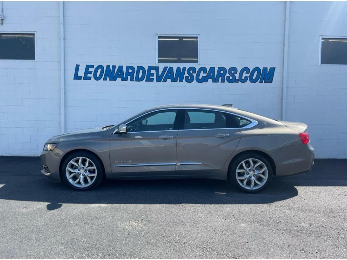 2018 Pepperdust Metallic /Jet Black Chevrolet Impala Premier (2G1125S36J9) with an 3.6L V6 DOHC 24V engine, 6A transmission, located at 6064 Gull Rd, Kalamazoo, MI, 49048, (269) 222-0088, 42.328388, -85.512924 - <b>Equipment</b><br>You'll never again be lost in a crowded city or a country region with the navigation system on this Chevrolet Impala. Engulf yourself with the crystal clear sound of a BOSE sound system in the vehicle. The leather seats in this vehicle are a must for buyers looking for comfort, - Photo#1