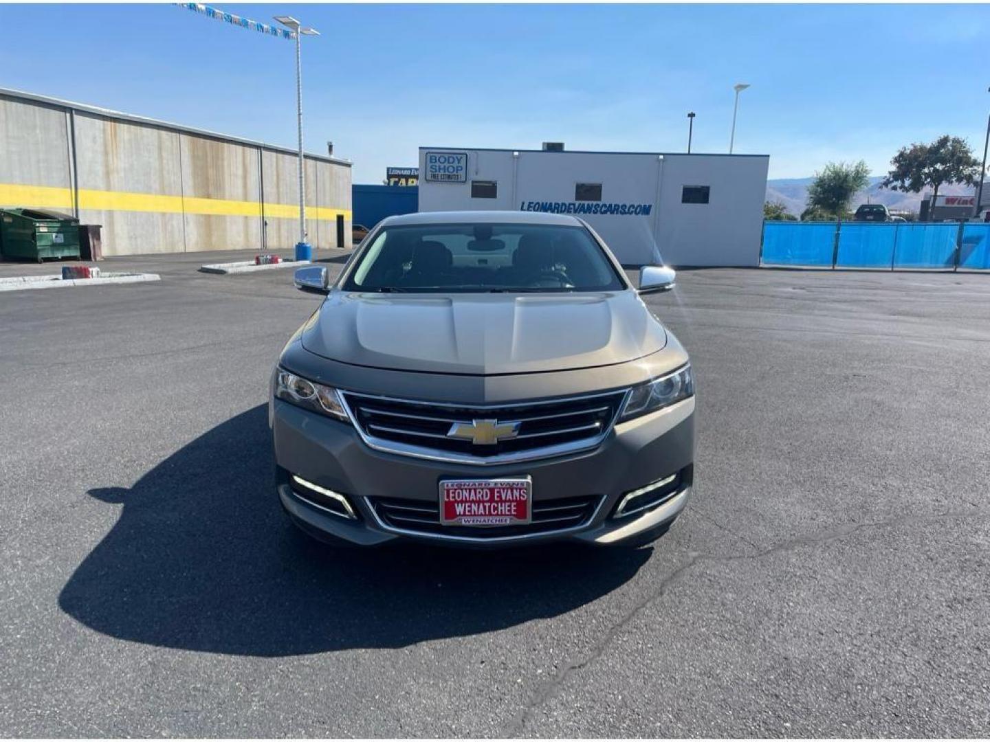 2018 Pepperdust Metallic /Jet Black Chevrolet Impala Premier (2G1125S36J9) with an 3.6L V6 DOHC 24V engine, 6A transmission, located at 6064 Gull Rd, Kalamazoo, MI, 49048, (269) 222-0088, 42.328388, -85.512924 - <b>Equipment</b><br>You'll never again be lost in a crowded city or a country region with the navigation system on this Chevrolet Impala. Engulf yourself with the crystal clear sound of a BOSE sound system in the vehicle. The leather seats in this vehicle are a must for buyers looking for comfort, - Photo#4