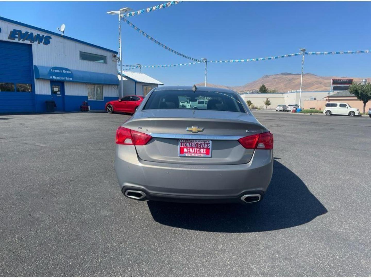 2018 Pepperdust Metallic /Jet Black Chevrolet Impala Premier (2G1125S36J9) with an 3.6L V6 DOHC 24V engine, 6A transmission, located at 6064 Gull Rd, Kalamazoo, MI, 49048, (269) 222-0088, 42.328388, -85.512924 - <b>Equipment</b><br>You'll never again be lost in a crowded city or a country region with the navigation system on this Chevrolet Impala. Engulf yourself with the crystal clear sound of a BOSE sound system in the vehicle. The leather seats in this vehicle are a must for buyers looking for comfort, - Photo#6