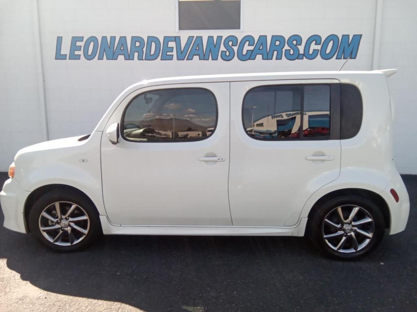 2011 White Pearl /Black/Gray Nissan cube 1.8 (JN8AZ2KR2BT) with an 1.8L L4 DOHC 16V engine, 6-Speed Manual transmission, located at 6064 Gull Rd, Kalamazoo, MI, 49048, (269) 222-0088, 42.328388, -85.512924 - <b>Equipment</b><br>You'll never again be lost in a crowded city or a country region with the navigation system on this small suv. Bluetooth technology is built into the Nissan cube, keeping your hands on the steering wheel and your focus on the road. This small suv is equipped with the latest gene - Photo#1