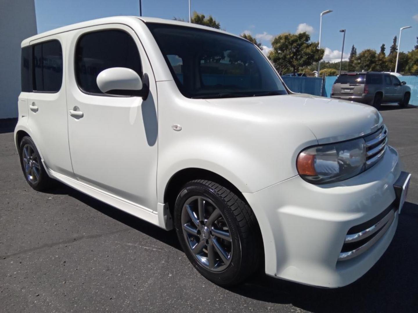 2011 White Pearl /Black/Gray Nissan cube 1.8 (JN8AZ2KR2BT) with an 1.8L L4 DOHC 16V engine, 6-Speed Manual transmission, located at 6064 Gull Rd, Kalamazoo, MI, 49048, (269) 222-0088, 42.328388, -85.512924 - <b>Equipment</b><br>You'll never again be lost in a crowded city or a country region with the navigation system on this small suv. Bluetooth technology is built into the Nissan cube, keeping your hands on the steering wheel and your focus on the road. This small suv is equipped with the latest gene - Photo#4