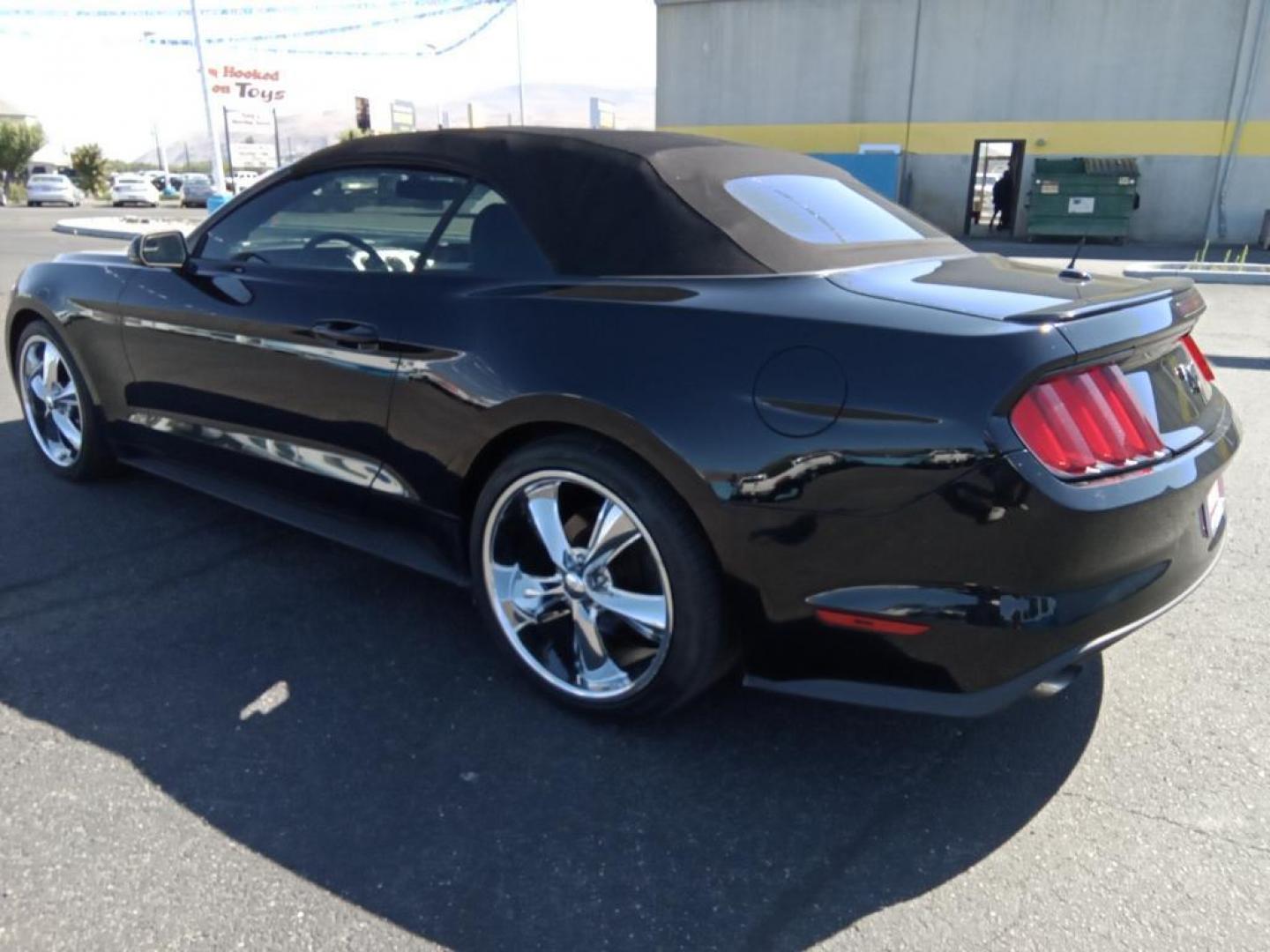 2016 Shadow Black /Yellow Jacket Ford Mustang EcoBoost Premium Convertible (1FATP8UH1G5) with an 2.3L L4 DOHC 16V engine, 6-speed automatic transmission, located at 6064 Gull Rd, Kalamazoo, MI, 49048, (269) 222-0088, 42.328388, -85.512924 - <b>Equipment</b><br>Bluetooth technology is built into this unit, keeping your hands on the steering wheel and your focus on the road. The leather seats in this unit are a must for buyers looking for comfort, durability, and style. This unit has a clean CARFAX vehicle history report. This model keep - Photo#7