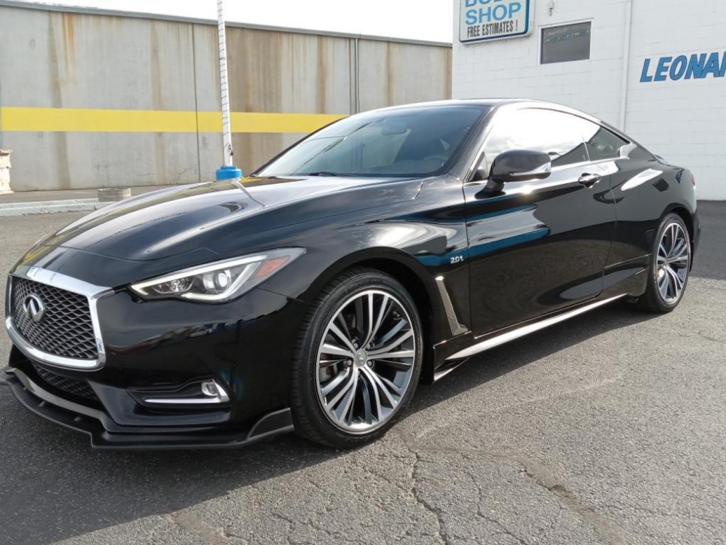 2017 Black Obsidian /Graphite Infiniti Q60 2.0t AWD (JN1CV7EL5HM) with an 2.0L L4 DOHC 16V TURBO engine, 7A transmission, located at 6064 Gull Rd, Kalamazoo, MI, 49048, (269) 222-0088, 42.328388, -85.512924 - <b>Equipment</b><br>The INFINITI Q60 features a hands-free Bluetooth phone system. The leather seats in this model are a must for buyers looking for comfort, durability, and style. This mid-size car is equipped with the latest generation of XM/Sirius Radio. The vehicle offers Automatic Climate Contr - Photo#2