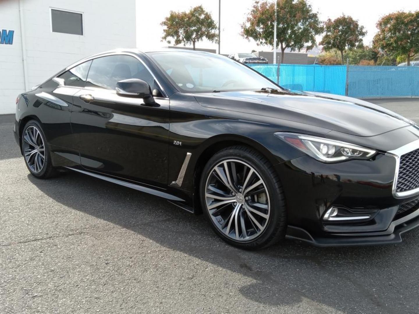 2017 Black Obsidian /Graphite Infiniti Q60 2.0t AWD (JN1CV7EL5HM) with an 2.0L L4 DOHC 16V TURBO engine, 7A transmission, located at 6064 Gull Rd, Kalamazoo, MI, 49048, (269) 222-0088, 42.328388, -85.512924 - <b>Equipment</b><br>The INFINITI Q60 features a hands-free Bluetooth phone system. The leather seats in this model are a must for buyers looking for comfort, durability, and style. This mid-size car is equipped with the latest generation of XM/Sirius Radio. The vehicle offers Automatic Climate Contr - Photo#4