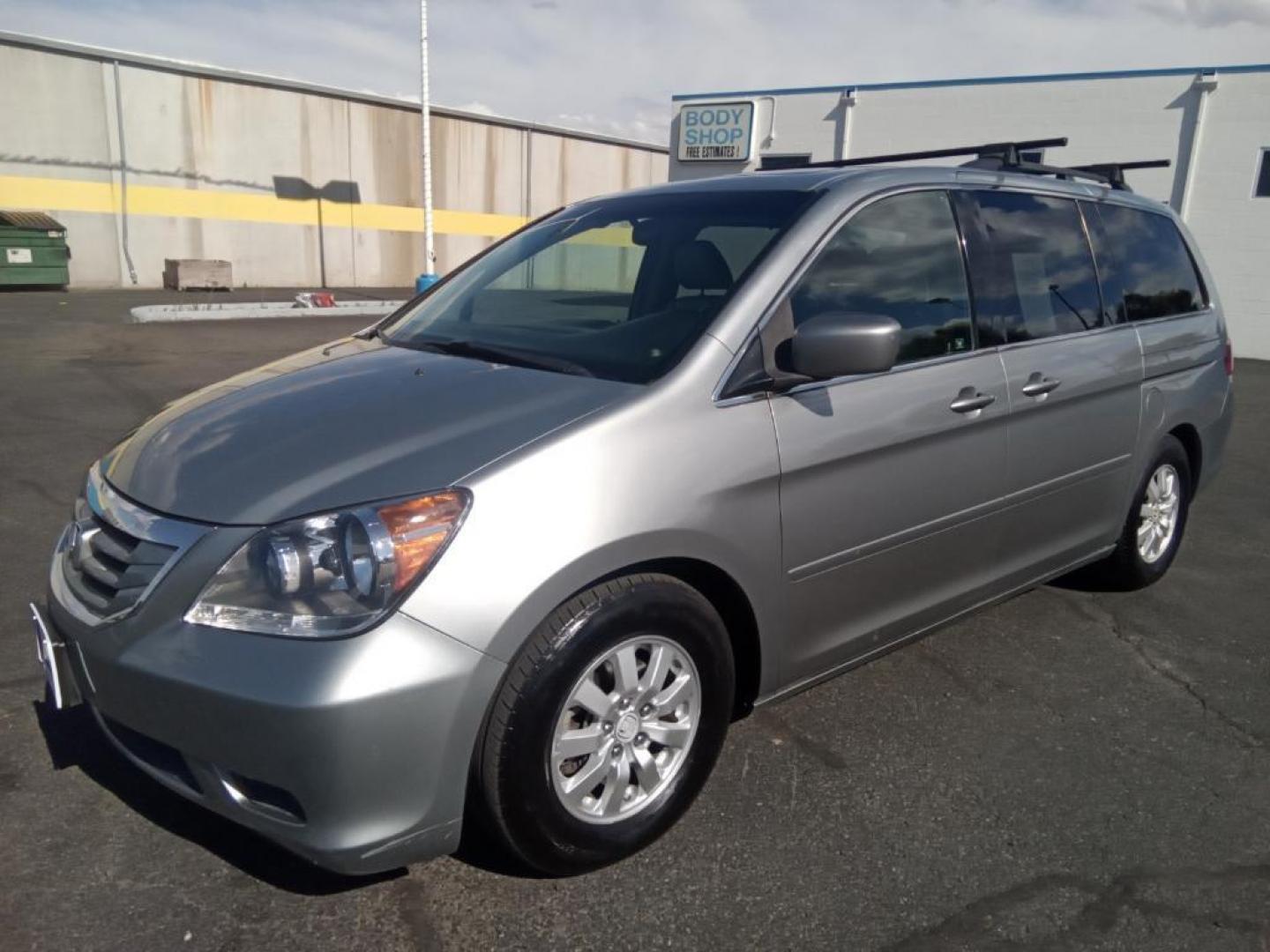 2009 Silver Pearl Metallic /Gray Honda Odyssey EX-L w/ DVD (5FNRL387X9B) with an 3.5L V6 SOHC 24V engine, 5-Speed Automatic transmission, located at 6064 Gull Rd, Kalamazoo, MI, 49048, (269) 222-0088, 42.328388, -85.512924 - The installed navigation system will keep you on the right path. It keeps you comfortable with Auto Climate. The leather seats in the vehicle are a must for buyers looking for comfort, durability, and style. See what's behind you with the back up camera on the Honda Odyssey. The vehicle is front whe - Photo#2