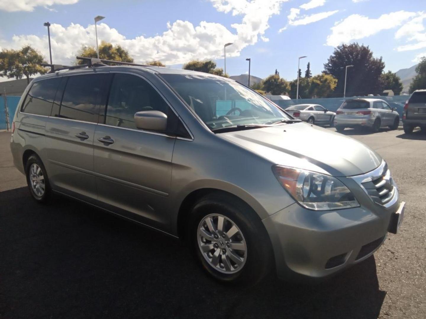 2009 Silver Pearl Metallic /Gray Honda Odyssey EX-L w/ DVD (5FNRL387X9B) with an 3.5L V6 SOHC 24V engine, 5-Speed Automatic transmission, located at 6064 Gull Rd, Kalamazoo, MI, 49048, (269) 222-0088, 42.328388, -85.512924 - The installed navigation system will keep you on the right path. It keeps you comfortable with Auto Climate. The leather seats in the vehicle are a must for buyers looking for comfort, durability, and style. See what's behind you with the back up camera on the Honda Odyssey. The vehicle is front whe - Photo#4