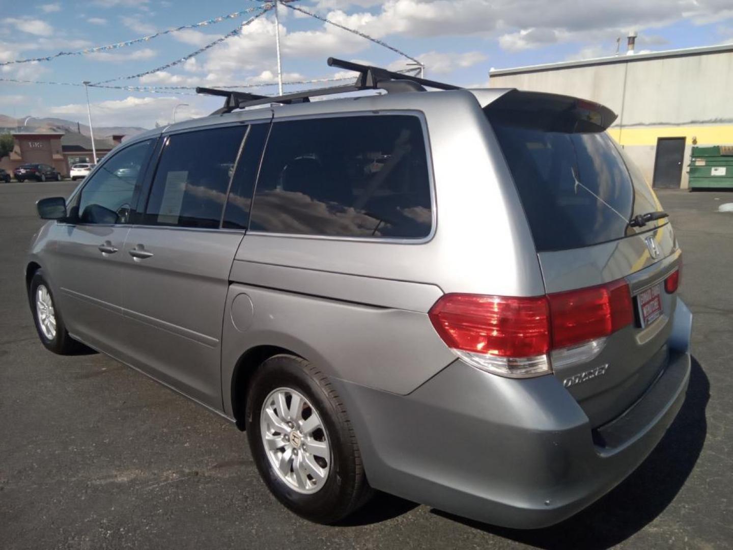 2009 Silver Pearl Metallic /Gray Honda Odyssey EX-L w/ DVD (5FNRL387X9B) with an 3.5L V6 SOHC 24V engine, 5-Speed Automatic transmission, located at 6064 Gull Rd, Kalamazoo, MI, 49048, (269) 222-0088, 42.328388, -85.512924 - The installed navigation system will keep you on the right path. It keeps you comfortable with Auto Climate. The leather seats in the vehicle are a must for buyers looking for comfort, durability, and style. See what's behind you with the back up camera on the Honda Odyssey. The vehicle is front whe - Photo#7