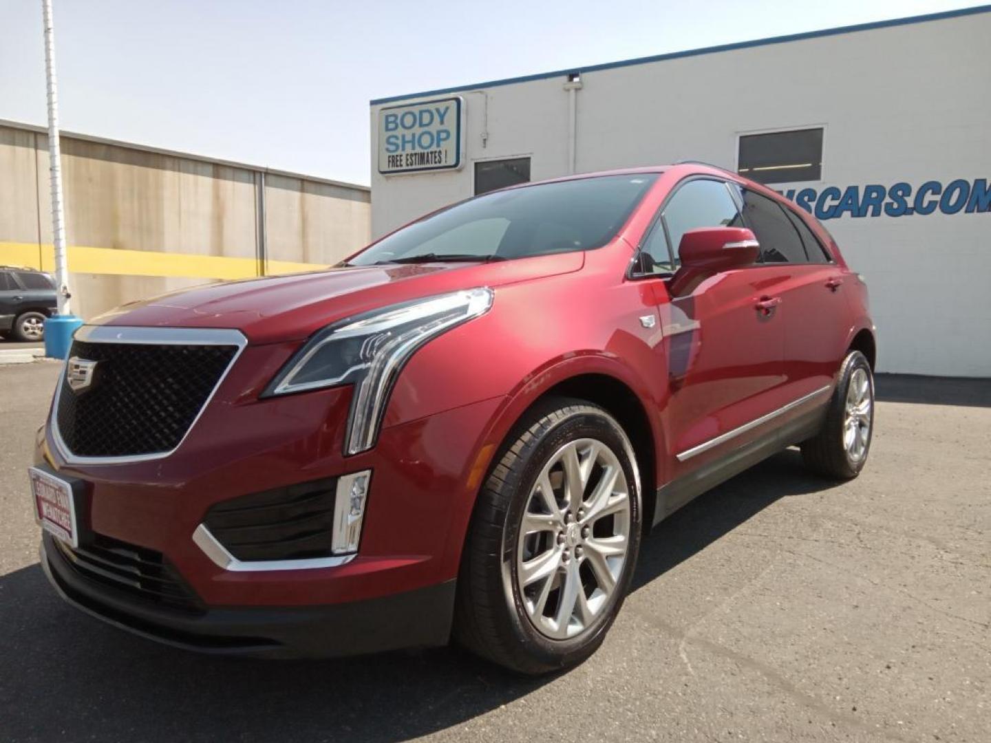 2020 Red Horizon Tintcoat Cadillac XT5 Sport AWD (1GYKNGRS6LZ) with an 3.6L V6 DOHC 24V engine, 8A transmission, located at 6064 Gull Rd, Kalamazoo, MI, 49048, (269) 222-0088, 42.328388, -85.512924 - See what's behind you with the back up camera on it. Bluetooth technology is built into it, keeping your hands on the steering wheel and your focus on the road. The leather seats in it are a must for buyers looking for comfort, durability, and style. Lane Keep Assist in this Cadillac XT5 helps maint - Photo#2