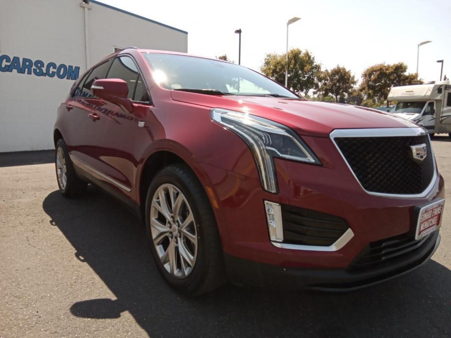 2020 Red Horizon Tintcoat Cadillac XT5 Sport AWD (1GYKNGRS6LZ) with an 3.6L V6 DOHC 24V engine, 8A transmission, located at 6064 Gull Rd, Kalamazoo, MI, 49048, (269) 222-0088, 42.328388, -85.512924 - See what's behind you with the back up camera on it. Bluetooth technology is built into it, keeping your hands on the steering wheel and your focus on the road. The leather seats in it are a must for buyers looking for comfort, durability, and style. Lane Keep Assist in this Cadillac XT5 helps maint - Photo#4