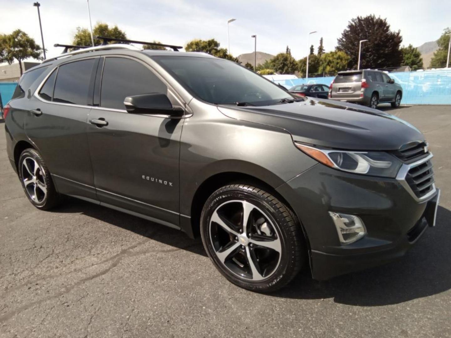 2019 Nightfall Gray Metallic /Jet Black Chevrolet Equinox LT 2.0 AWD (2GNAXVEX4K6) with an 2.0L L4 DOHC 16V engine, 9A transmission, located at 6064 Gull Rd, Kalamazoo, MI, 49048, (269) 222-0088, 42.328388, -85.512924 - <b>Equipment</b><br>This vehicle is a certified CARFAX 1-owner. The installed navigation system will keep you on the right path. The vehicle offers Apple CarPlay for seamless connectivity. This model comes equipped with Android Auto for seamless smartphone integration on the road. This vehicle keeps - Photo#4