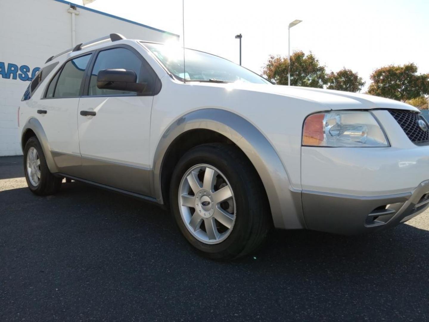 2006 White Ford Freestyle SE AWD (1FMZK04126G) with an 3.0L V6 DOHC 24V engine, Automatic CVT Overdrive transmission, located at 6064 Gull Rd, Kalamazoo, MI, 49048, (269) 222-0088, 42.328388, -85.512924 - Our dealership has already run the CARFAX report and it is clean. A clean CARFAX is a great asset for resale value in the future. Conquer any rainy, snowy, or icy road conditions this winter with the all wheel drive system on this vehicle. Set the temperature exactly where you are most comfortable - Photo#4