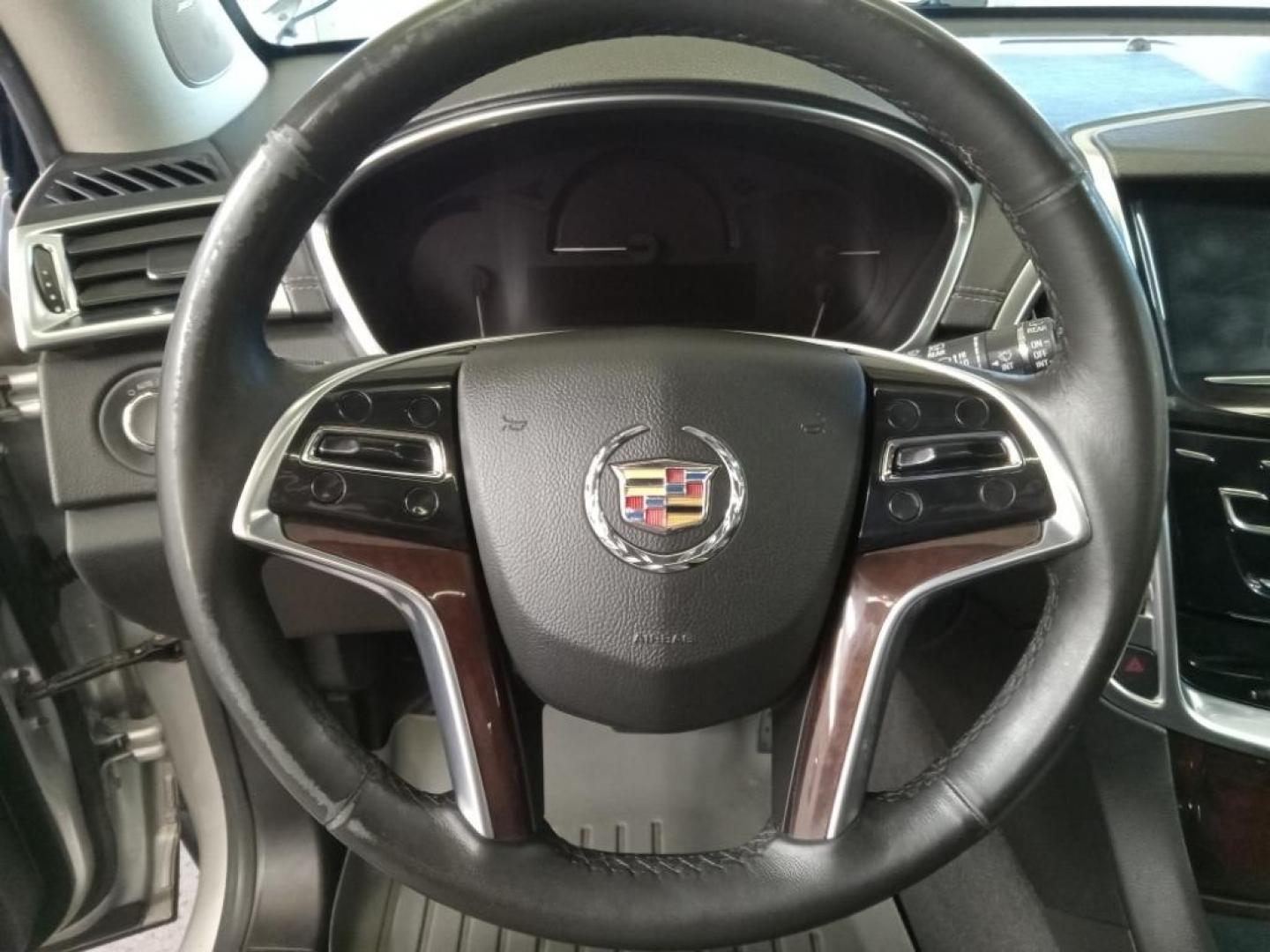 2015 Radiant Silver Metallic /Ebony/Ebony Accents Cadillac SRX Luxury Collection AWD (3GYFNEE33FS) with an 3.6L V6 DOHC 24V FFV engine, 6-Speed Automatic transmission, located at 6064 Gull Rd, Kalamazoo, MI, 49048, (269) 222-0088, 42.328388, -85.512924 - <b>Equipment</b><br>The leather seats in this Cadillac SRX are a must for buyers looking for comfort, durability, and style. Keep your hands warm all winter with a heated steering wheel in it . Enjoy the heated seats in this unit you will never buy a vehicle without them. Everyone loves the comfor - Photo#10