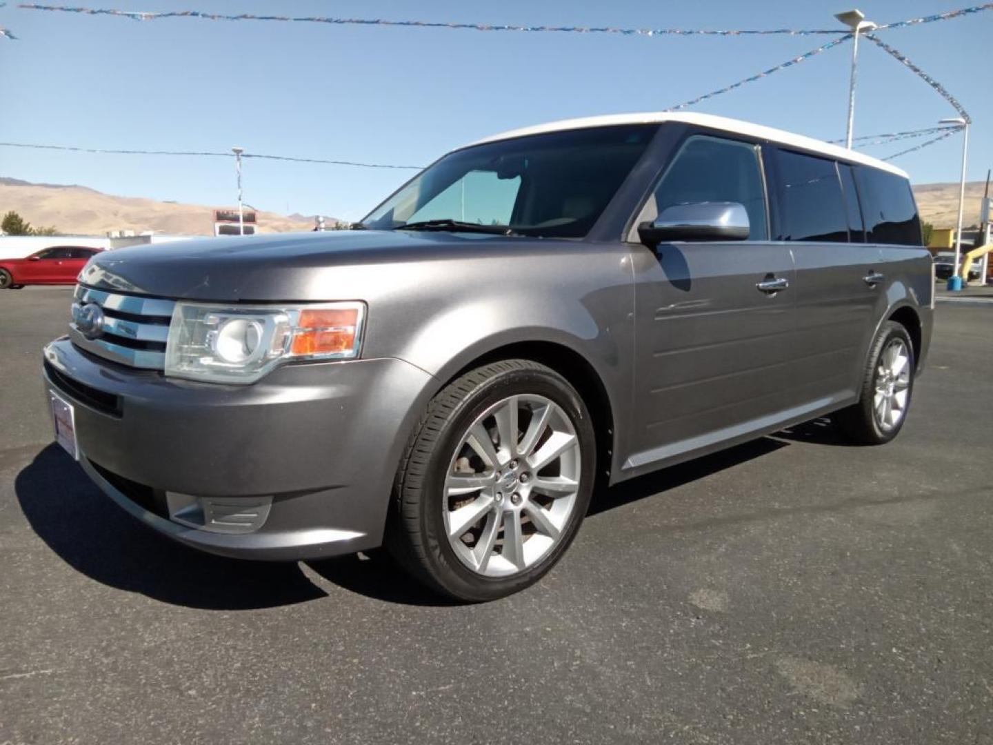 2010 Sterling Gray Metallic /Medium Light Stone Ford Flex Limited AWD (2FMHK6DC9AB) with an 3.5L V6 DOHC 24V engine, 6-Speed Automatic Overdrive transmission, located at 6064 Gull Rd, Kalamazoo, MI, 49048, (269) 222-0088, 42.328388, -85.512924 - <b>Equipment</b><br>This model offers Automatic Climate Control for personalized comfort. The state of the art park assist system will guide you easily into any spot. The installed navigation system will keep you on the right path. Bluetooth technology is built into this vehicle, keeping your hands - Photo#2