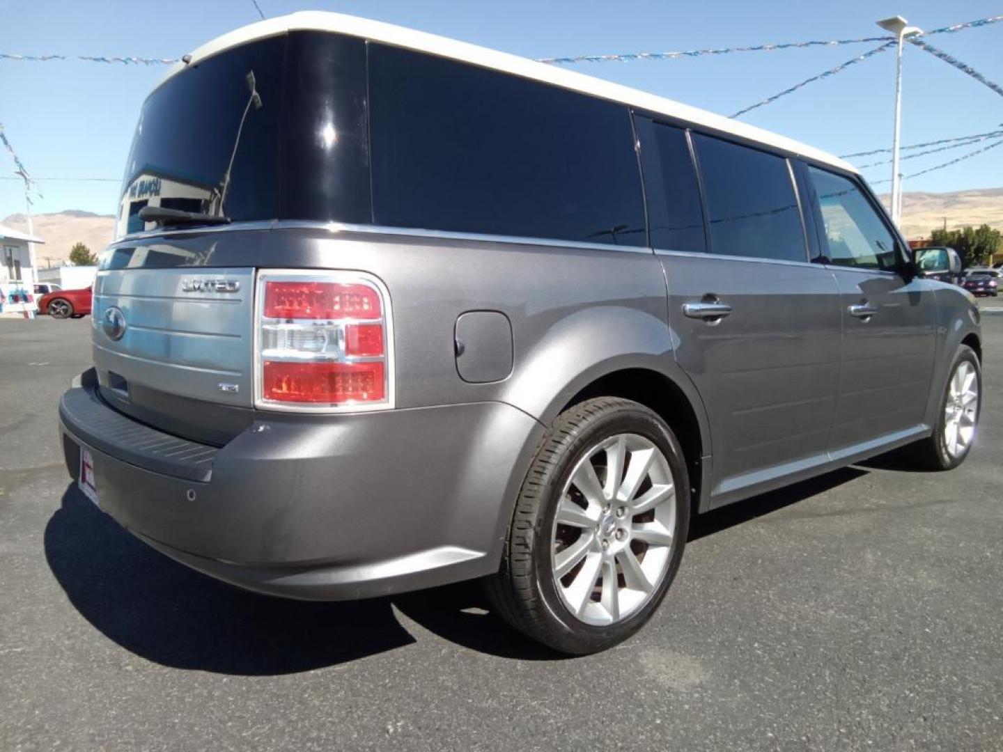 2010 Sterling Gray Metallic /Medium Light Stone Ford Flex Limited AWD (2FMHK6DC9AB) with an 3.5L V6 DOHC 24V engine, 6-Speed Automatic Overdrive transmission, located at 6064 Gull Rd, Kalamazoo, MI, 49048, (269) 222-0088, 42.328388, -85.512924 - <b>Equipment</b><br>This model offers Automatic Climate Control for personalized comfort. The state of the art park assist system will guide you easily into any spot. The installed navigation system will keep you on the right path. Bluetooth technology is built into this vehicle, keeping your hands - Photo#5