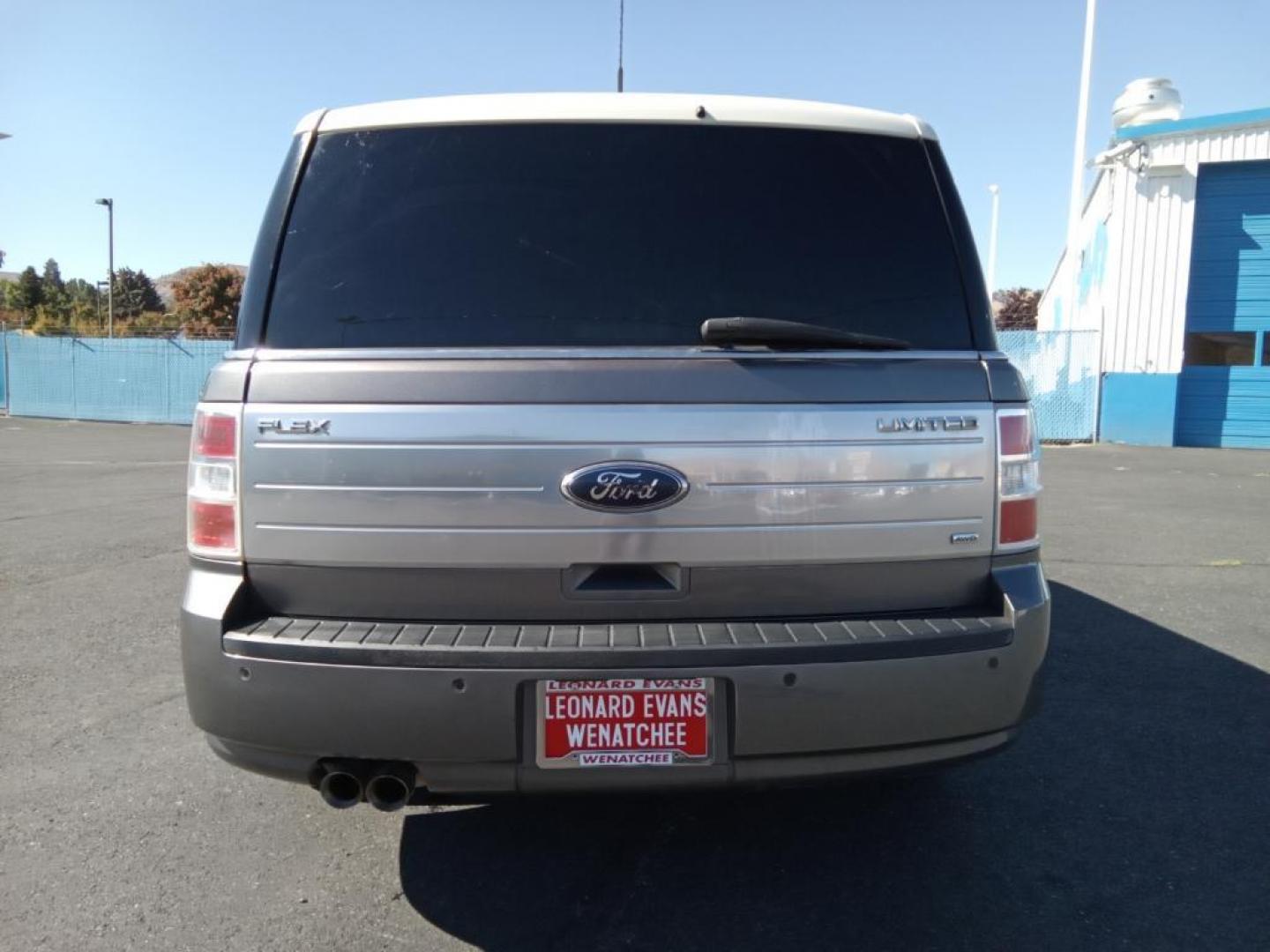 2010 Sterling Gray Metallic /Medium Light Stone Ford Flex Limited AWD (2FMHK6DC9AB) with an 3.5L V6 DOHC 24V engine, 6-Speed Automatic Overdrive transmission, located at 6064 Gull Rd, Kalamazoo, MI, 49048, (269) 222-0088, 42.328388, -85.512924 - <b>Equipment</b><br>This model offers Automatic Climate Control for personalized comfort. The state of the art park assist system will guide you easily into any spot. The installed navigation system will keep you on the right path. Bluetooth technology is built into this vehicle, keeping your hands - Photo#6